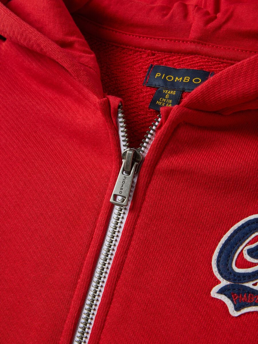 Red organic cotton hoodie with embroidered details, oversized fit, for boys_1