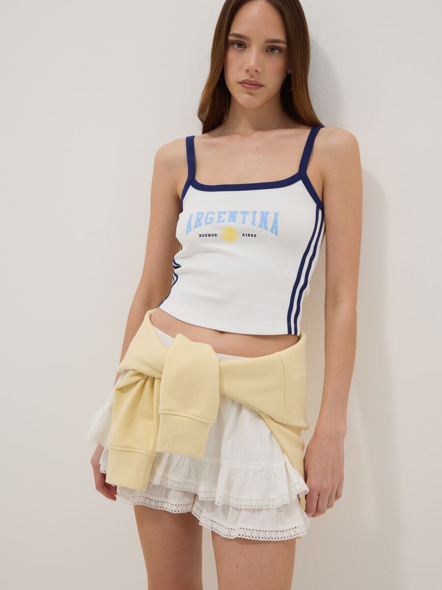 Wei&szlig;es Tanktop aus Stretch-Baumwolle mit blauer Paspelierung_0