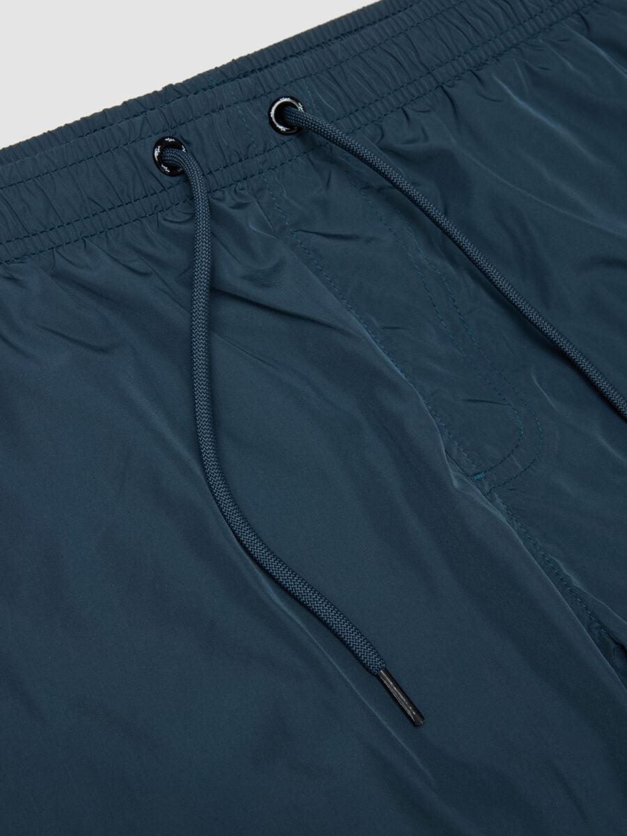Ba&ntilde;ador tipo b&oacute;xer azul con cintura el&aacute;stica y cord&oacute;n ajustable_5