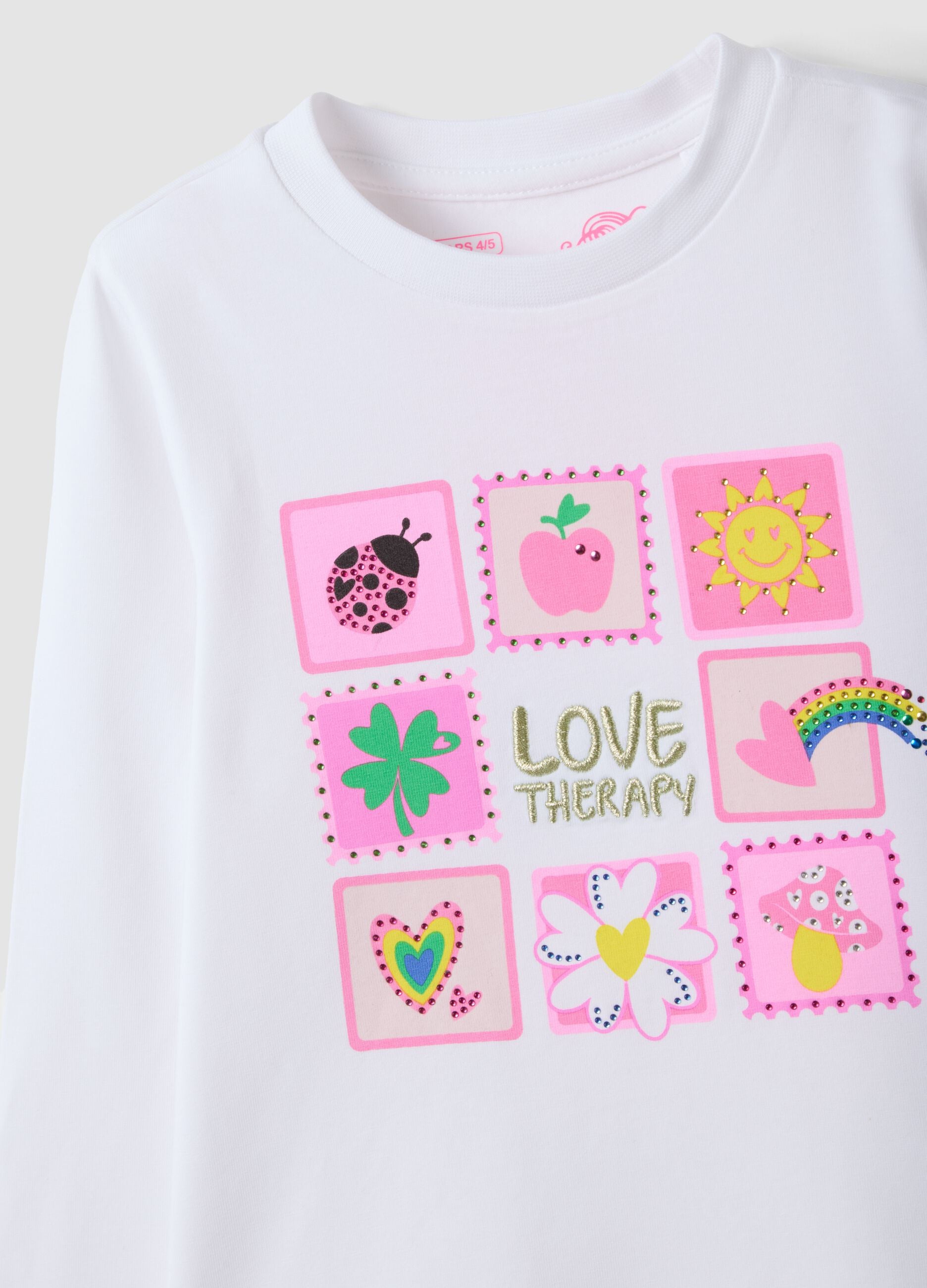 T-shirt bianca in cotone elasticizzato con girocollo e stampa per bambina