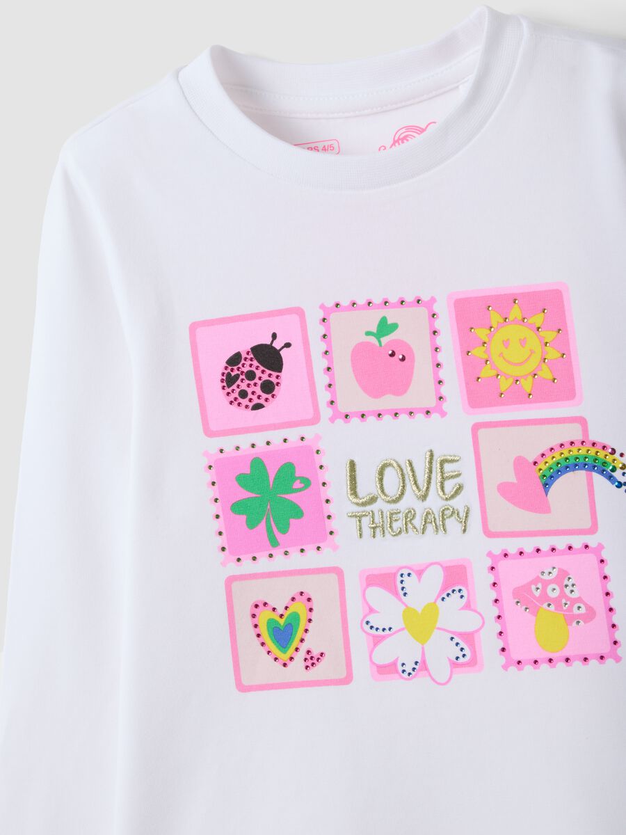T-shirt bianca in cotone elasticizzato con girocollo e stampa per bambina_2
