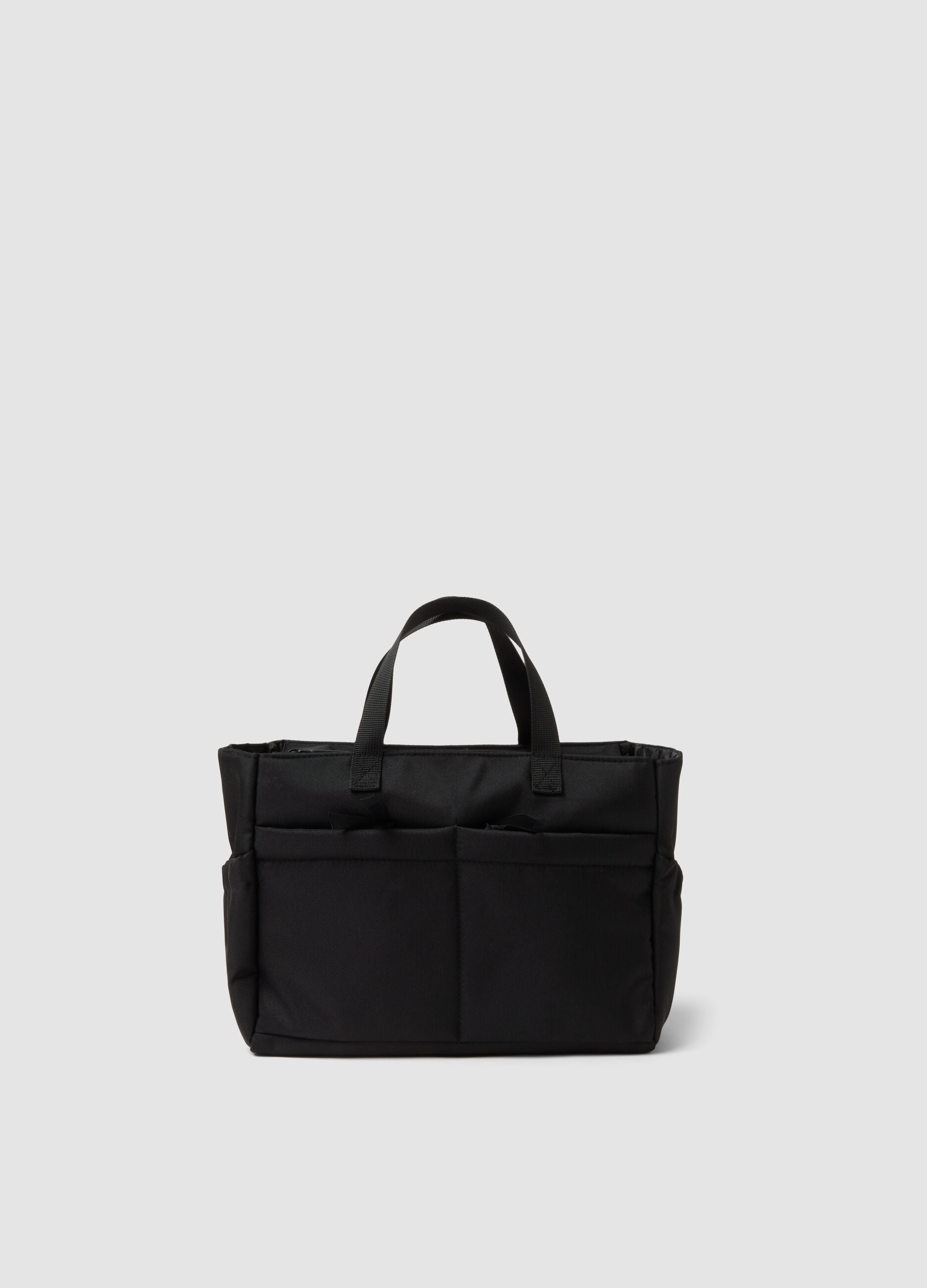 Black handbag with external pockets and double handles