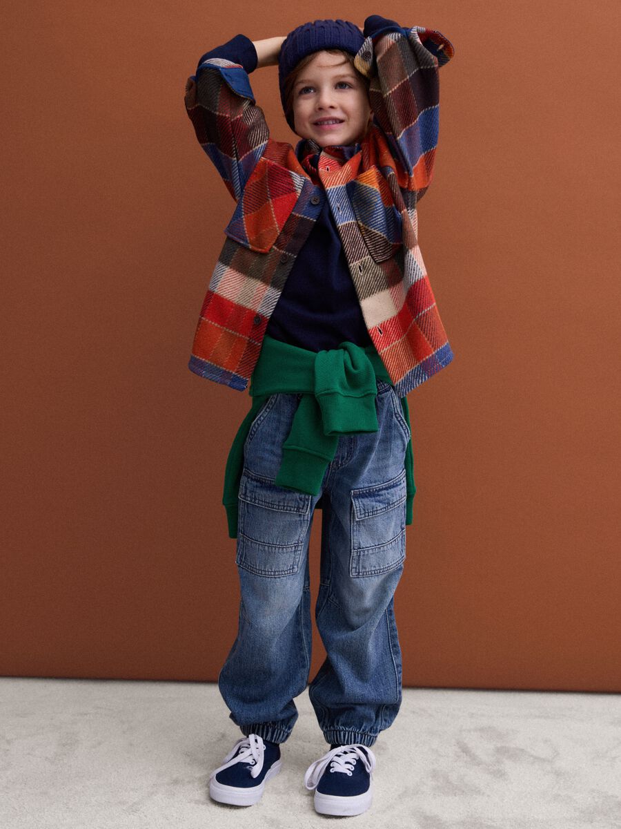Blue denim joggers in cotton and viscose blend, relaxed fit for boys_1