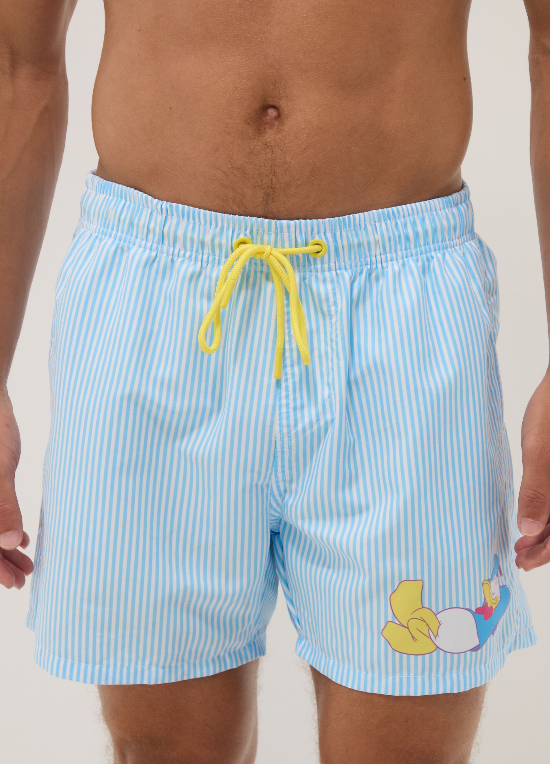 Blue and white striped swim boxers with Donald Duck print