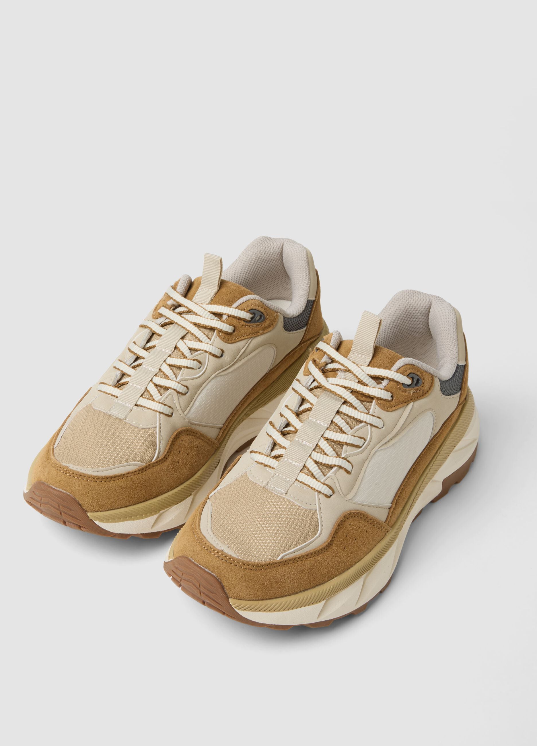 Beige lace-up trainers with contrast inserts