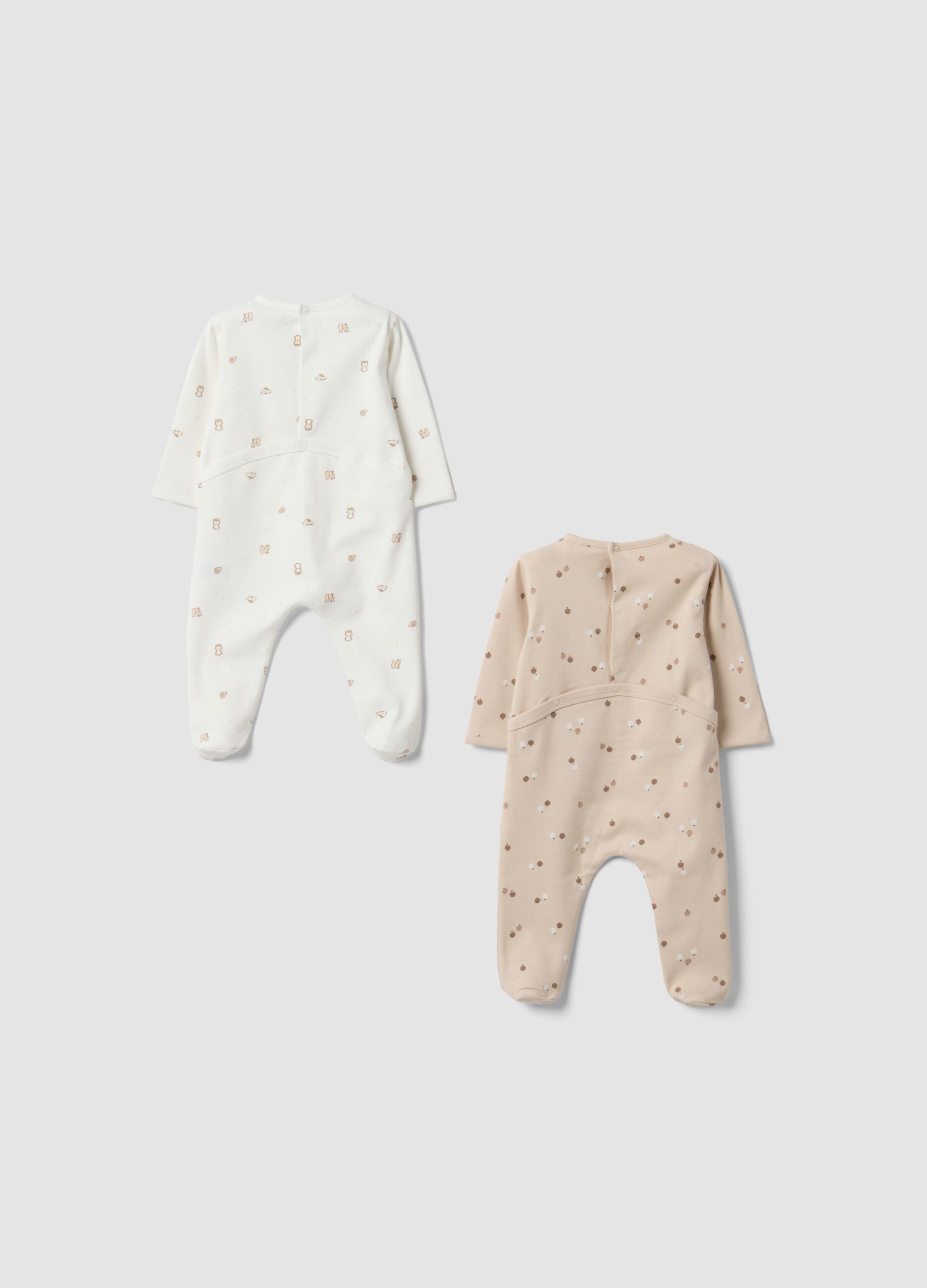 2-pack of white and beige printed organic cotton sleepsuits