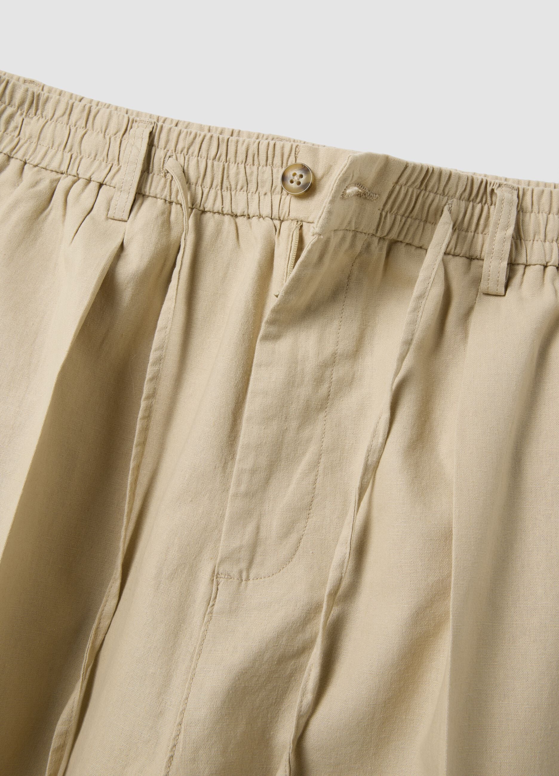 Beige linen-cotton blend trousers with an elasticated waist