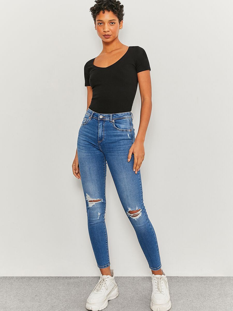 Distressed-effect push-up jeans_0