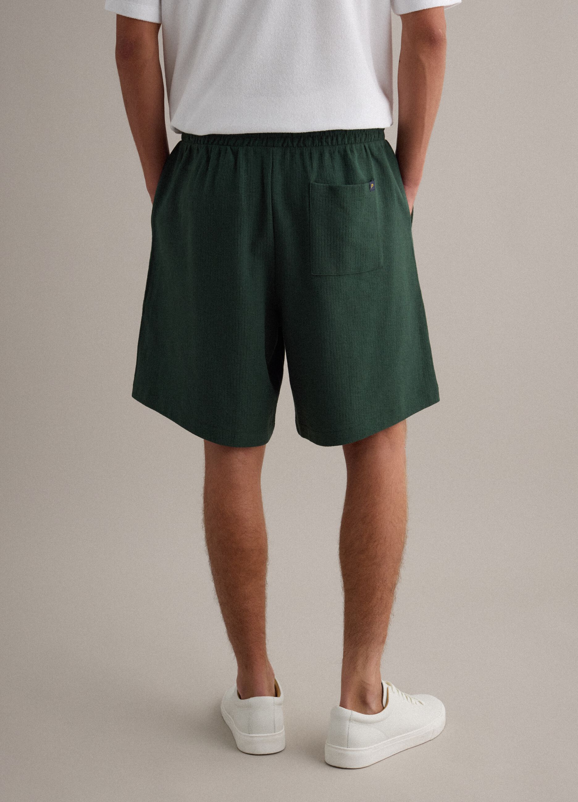Green cotton-blend jogger shorts with drawstring, relaxed fit