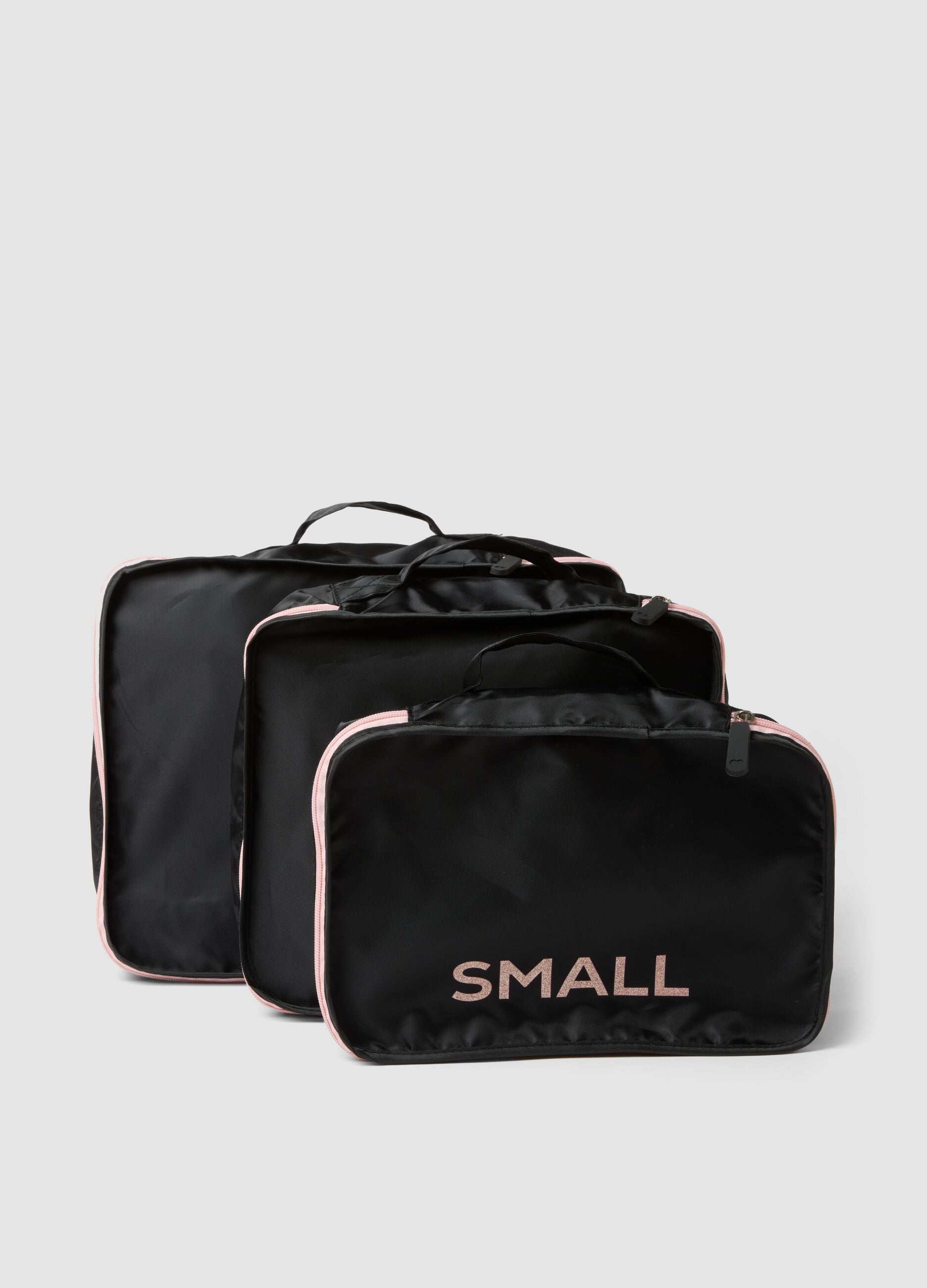 Set di tre organizer neri da viaggio con zip rosa