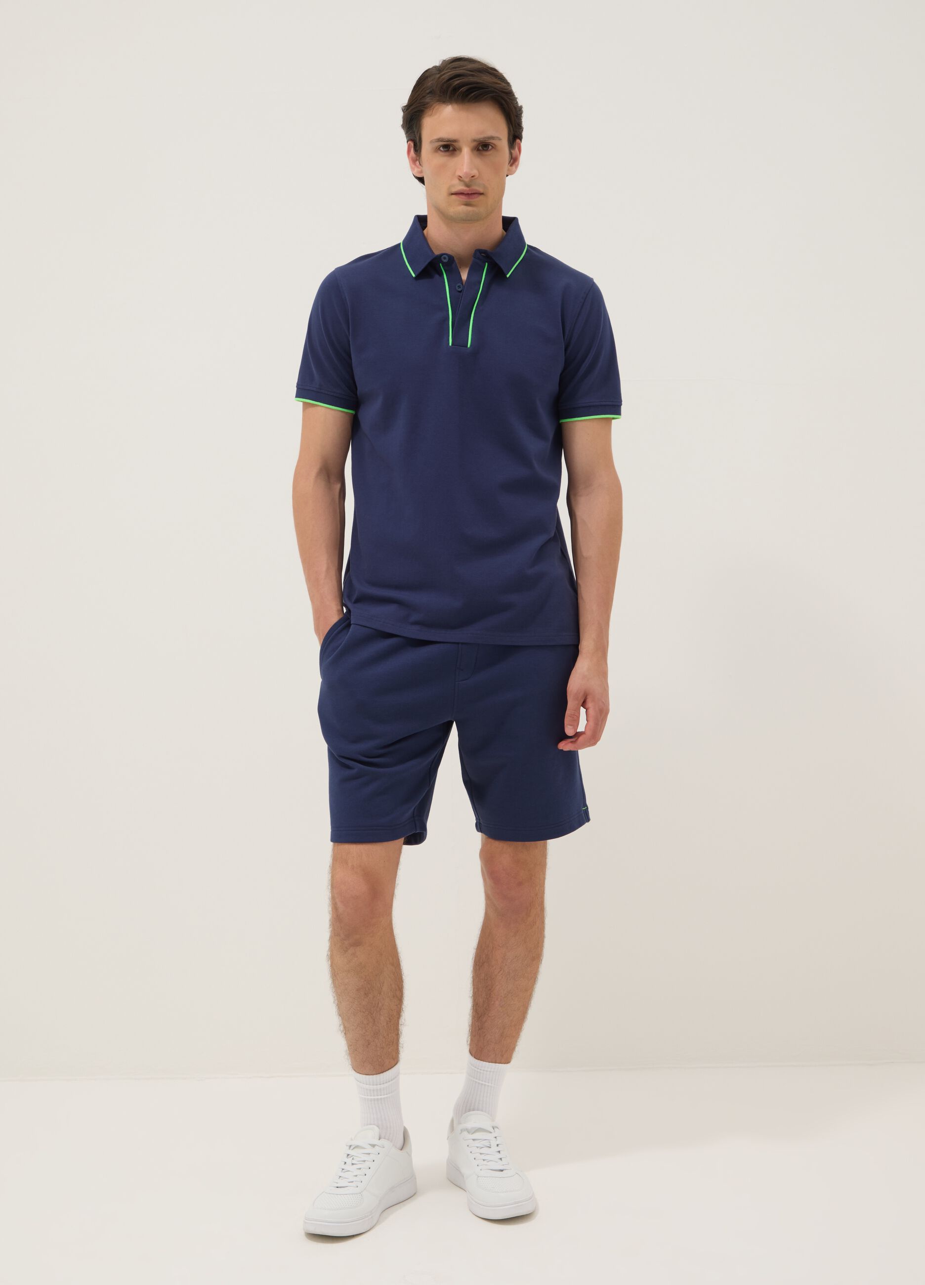 Blue short-sleeved polo in stretch cotton
