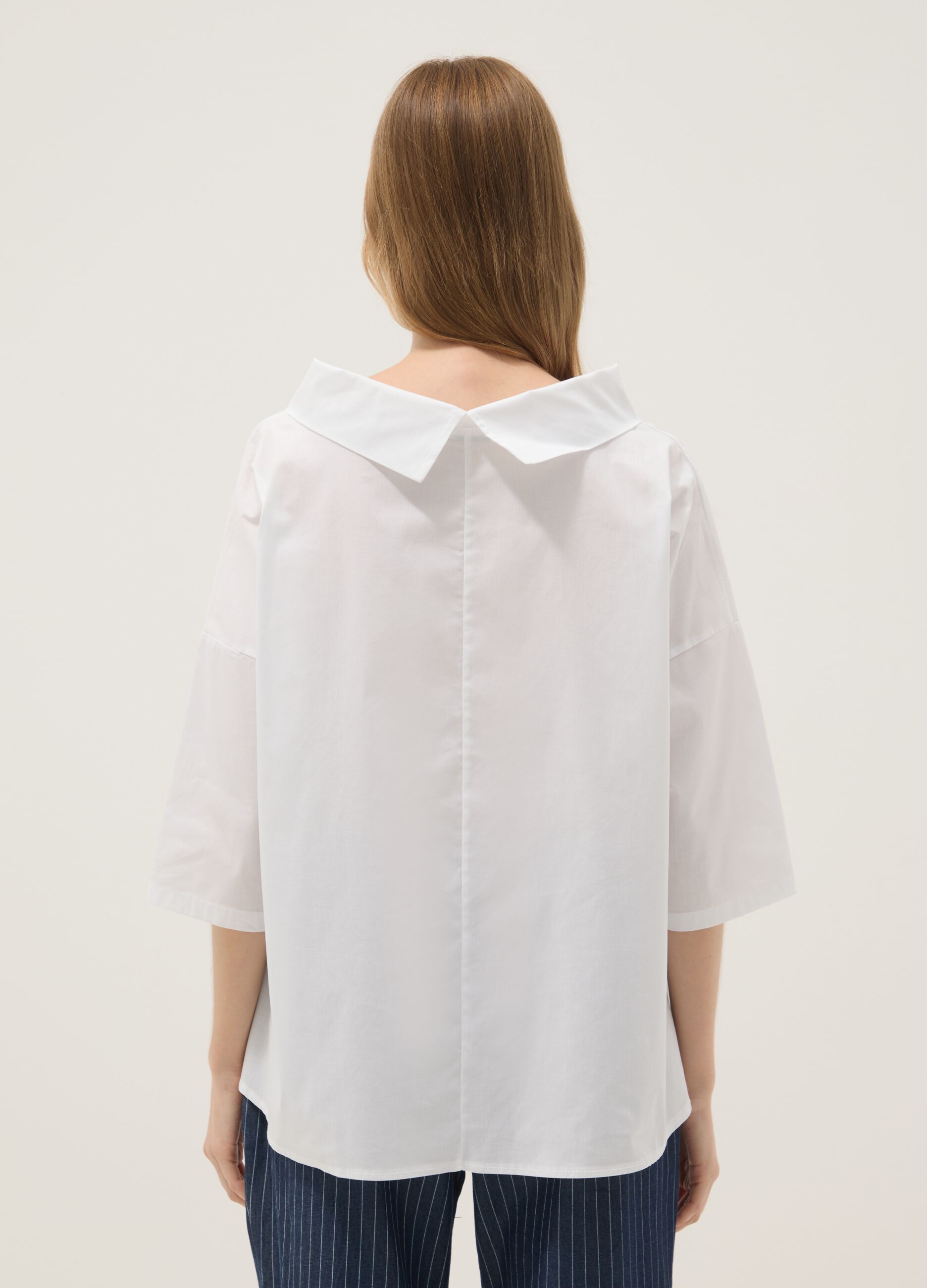 White stretch-cotton top with soft funnel neck