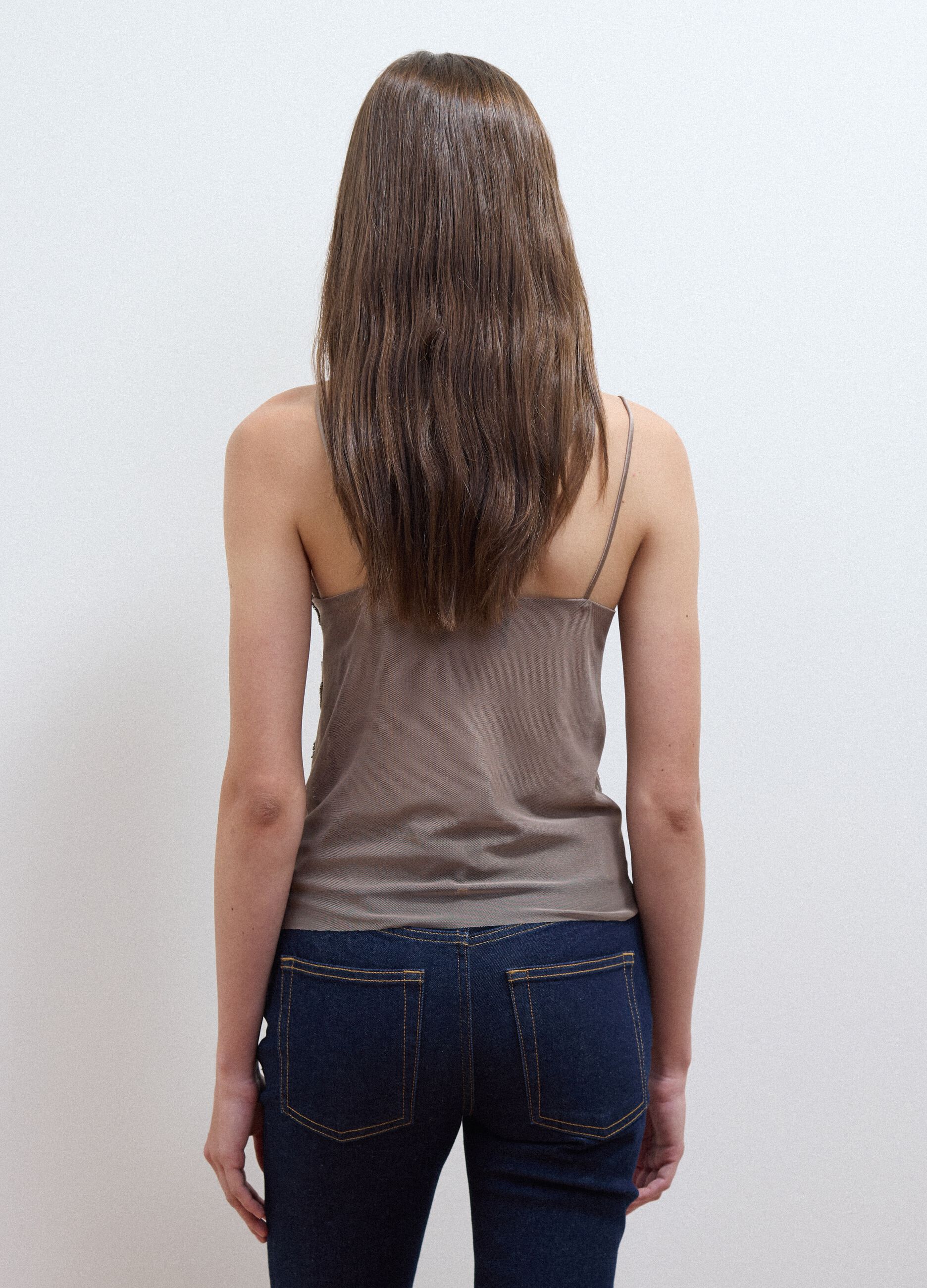 Beige fitted tank top with thin straps in stretch fabric