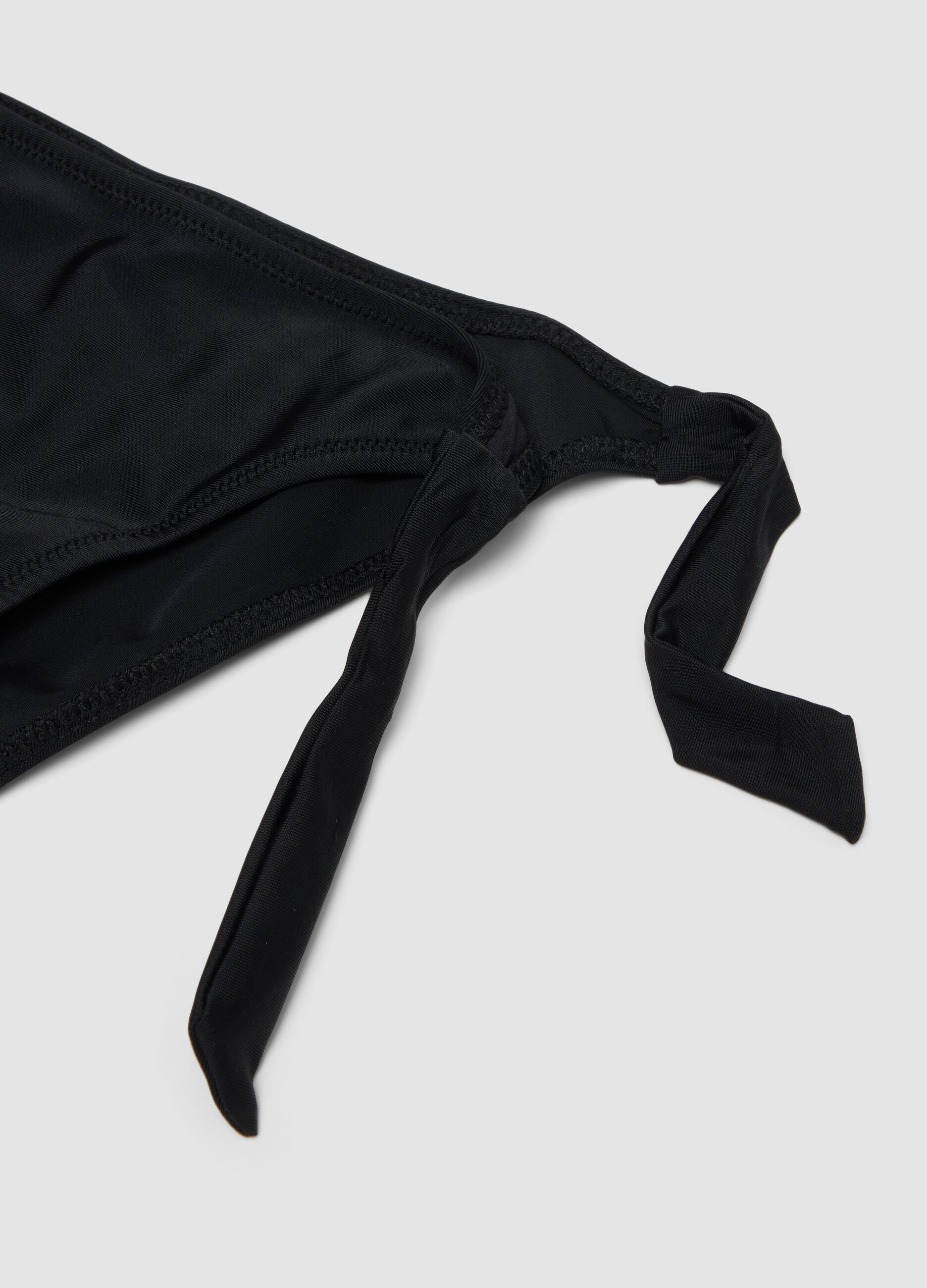 Black triangle bikini in stretch fabric with frills