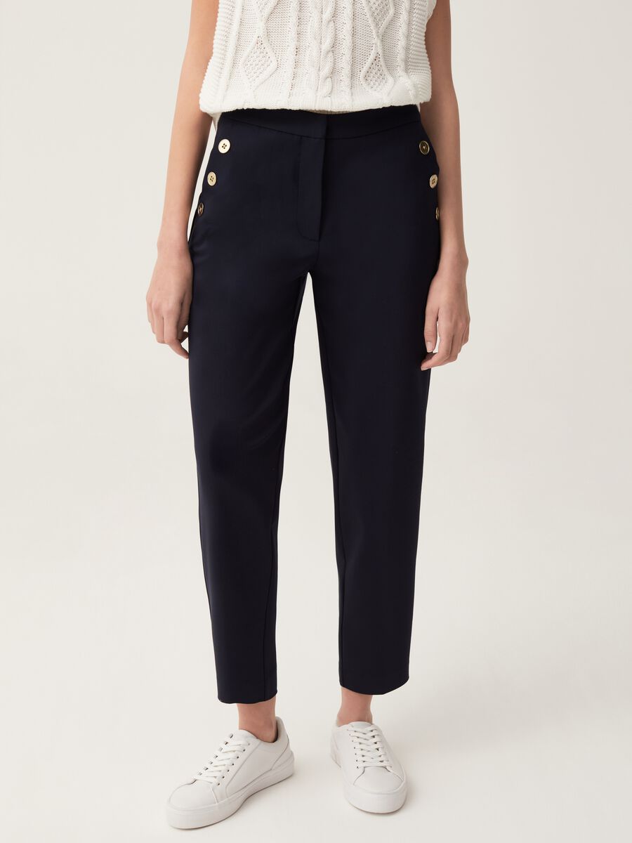 Cigarette trousers with gold-coloured buttons_1