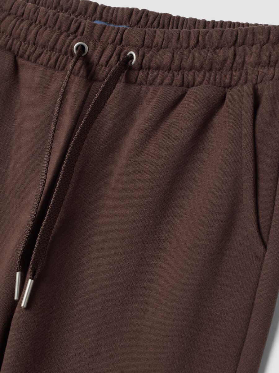 Brown flared trousers in pure organic cotton_1