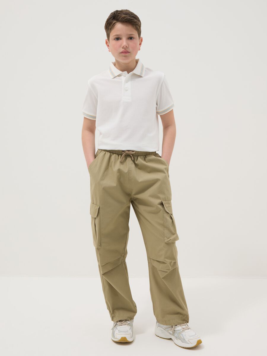 Beige cargo trousers in pure cotton regular fit for boys_0
