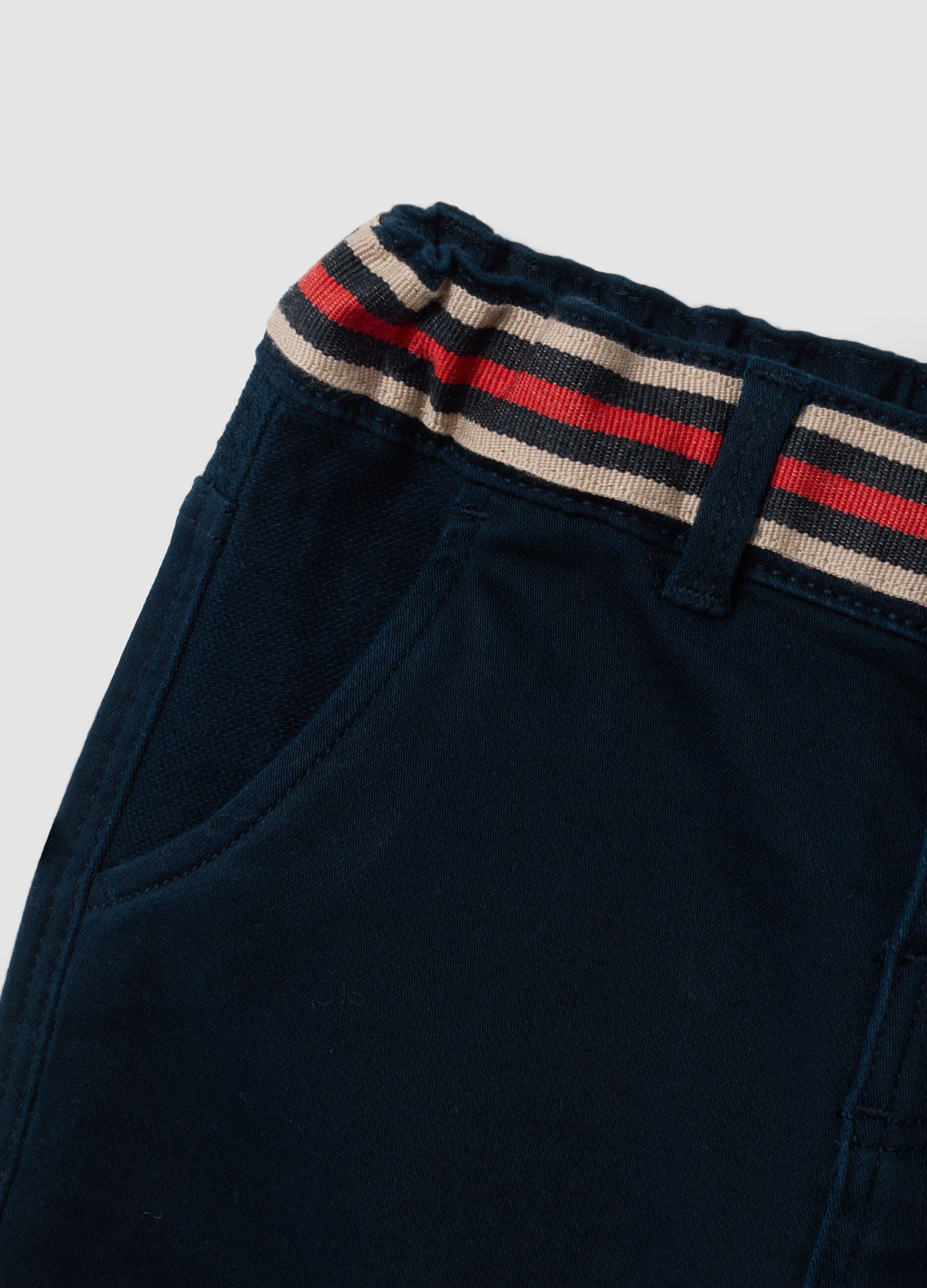 Blue stretch cotton trousers with elasticated waist for baby boy