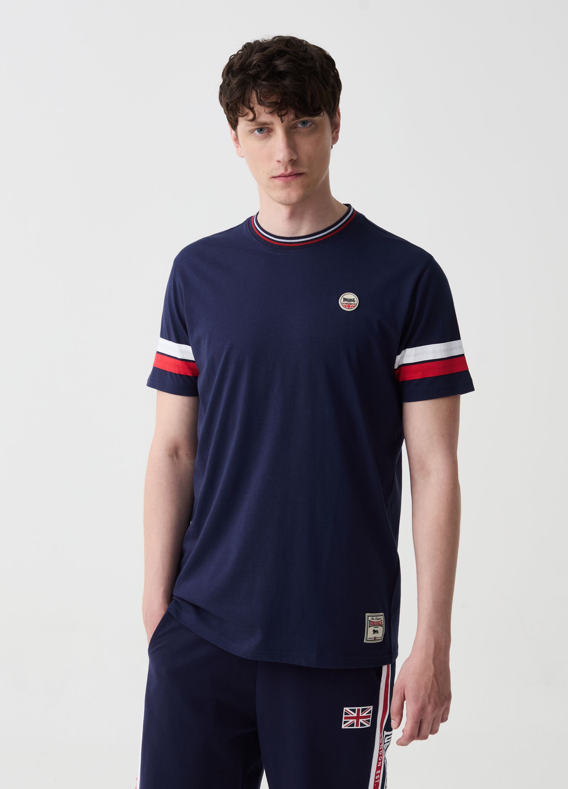 T-shirt with striped edging and patch