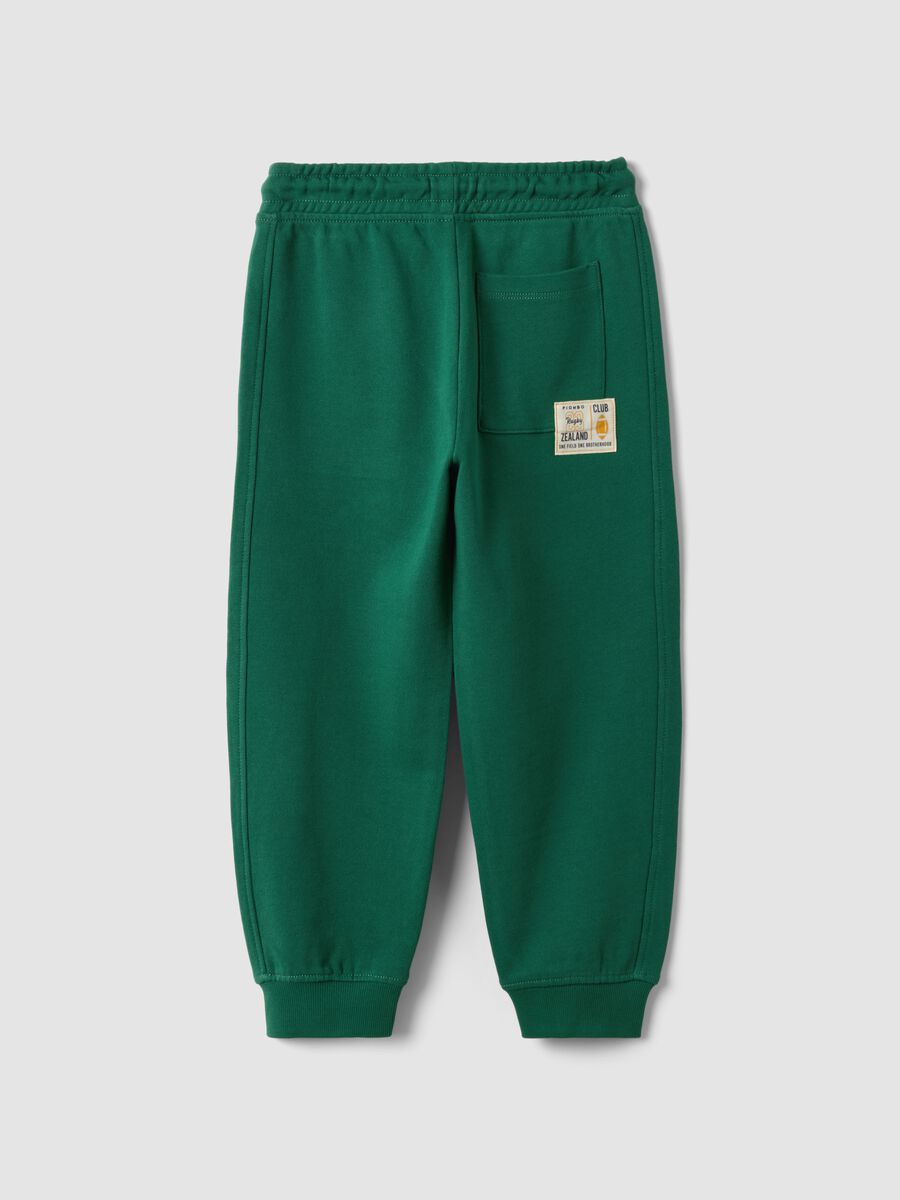 Green pure cotton jogger trousers with elasticated waist for boys_1