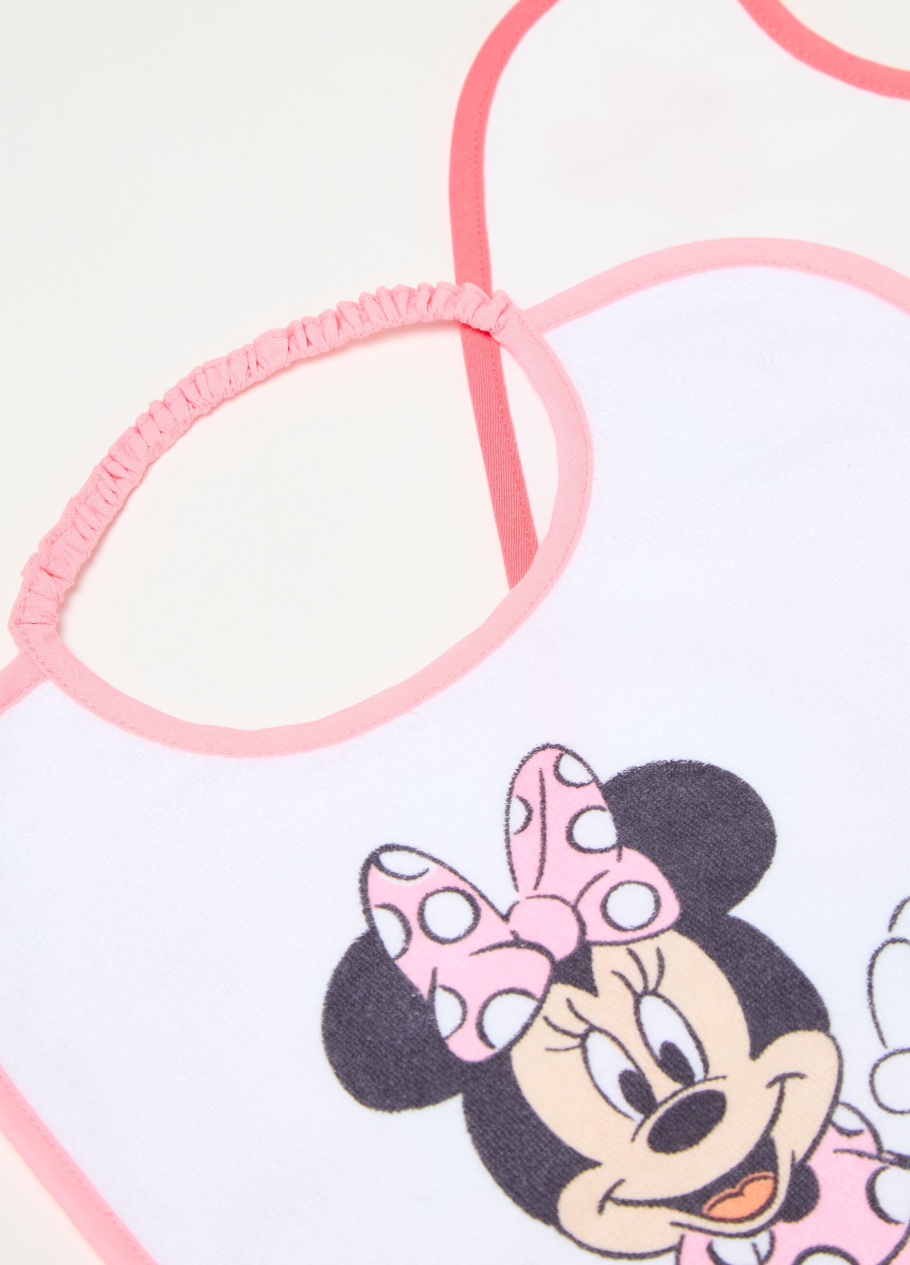 Two-pack bibs with PEVA backing and Minnie Mouse print