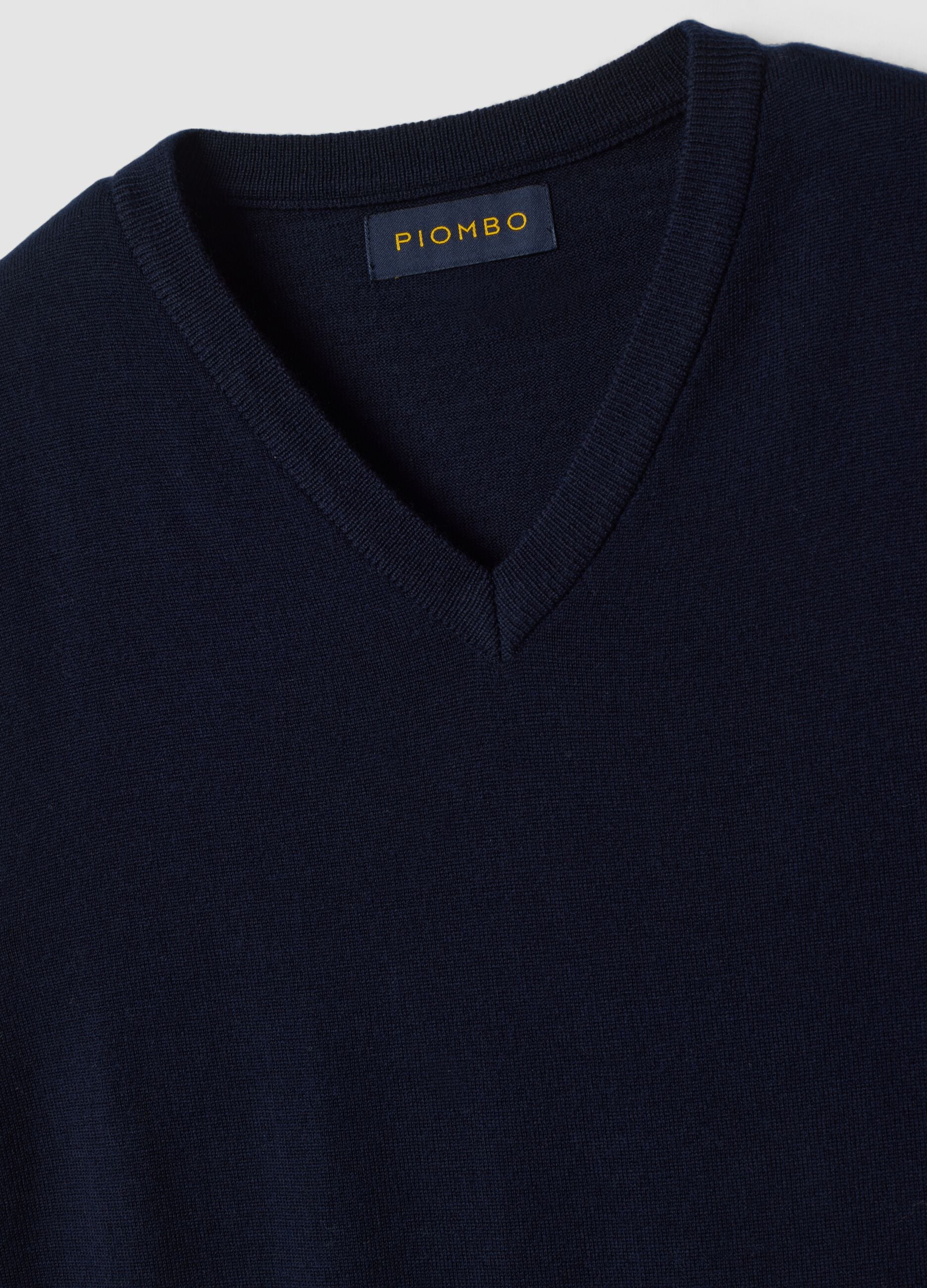 Navy blue pure merino wool gilet with deep V-neck, regular fit