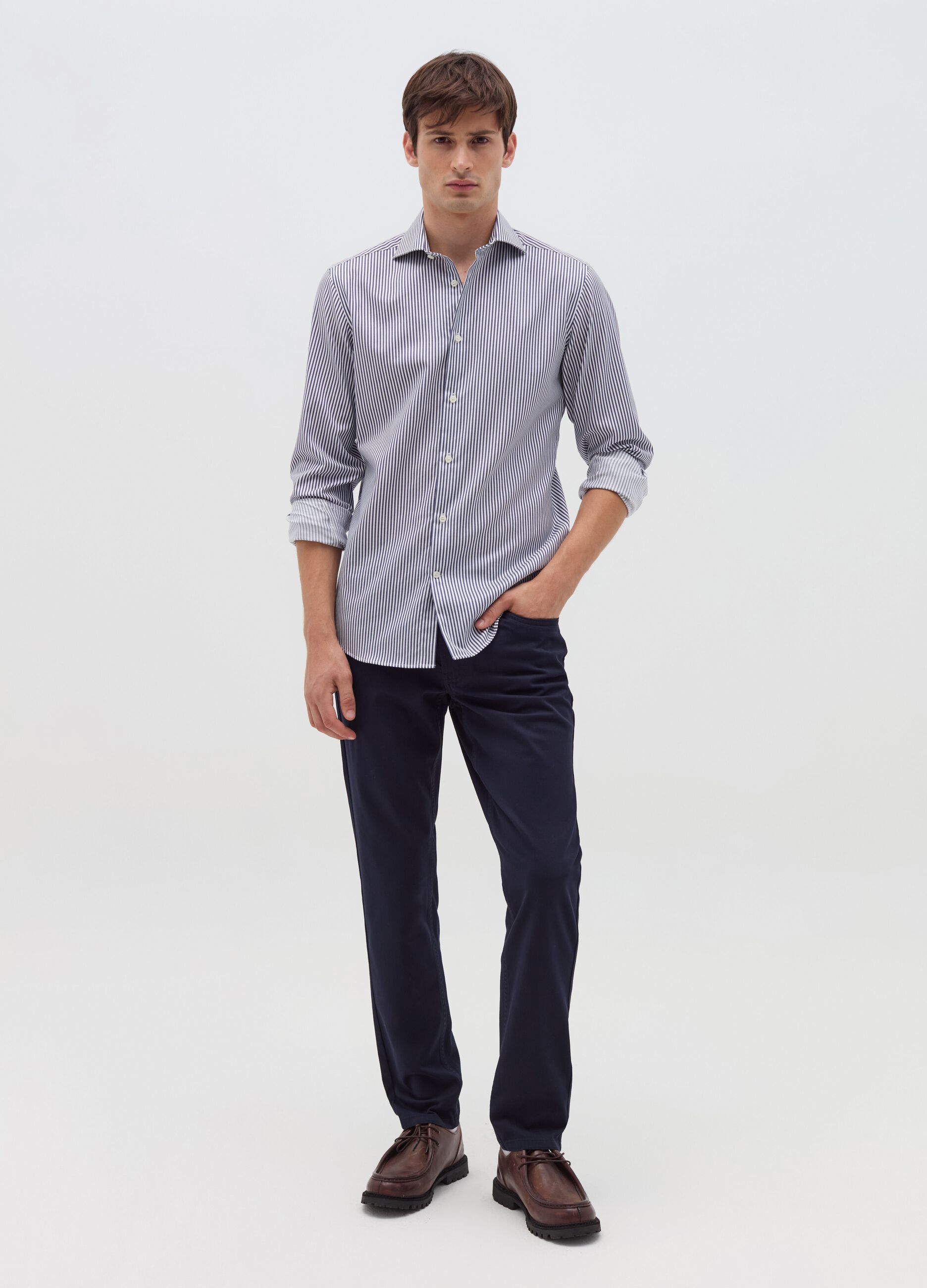 Trousers with five pockets and couture stitched weave