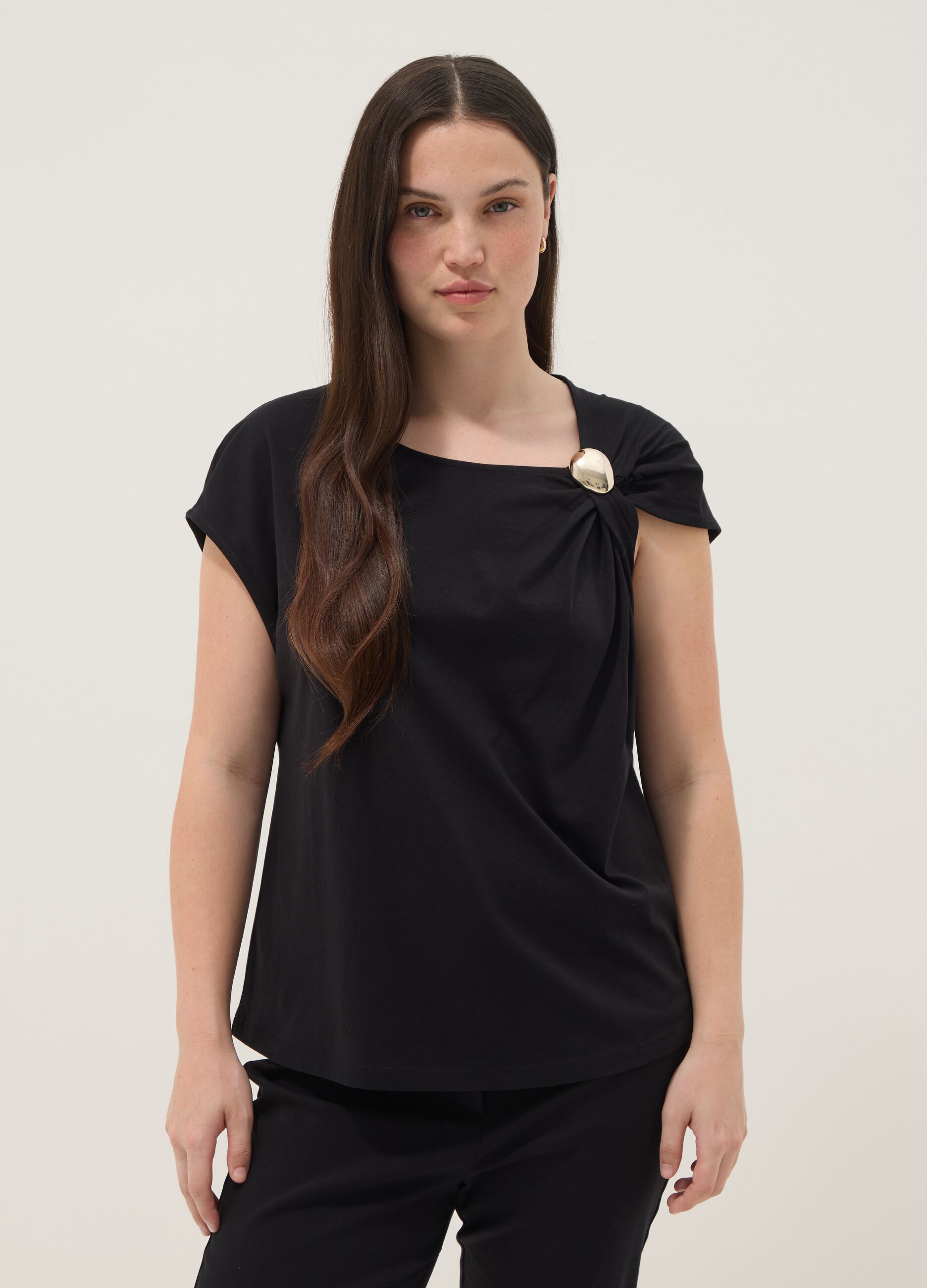 Black pure cotton T-shirt with draping and brooch