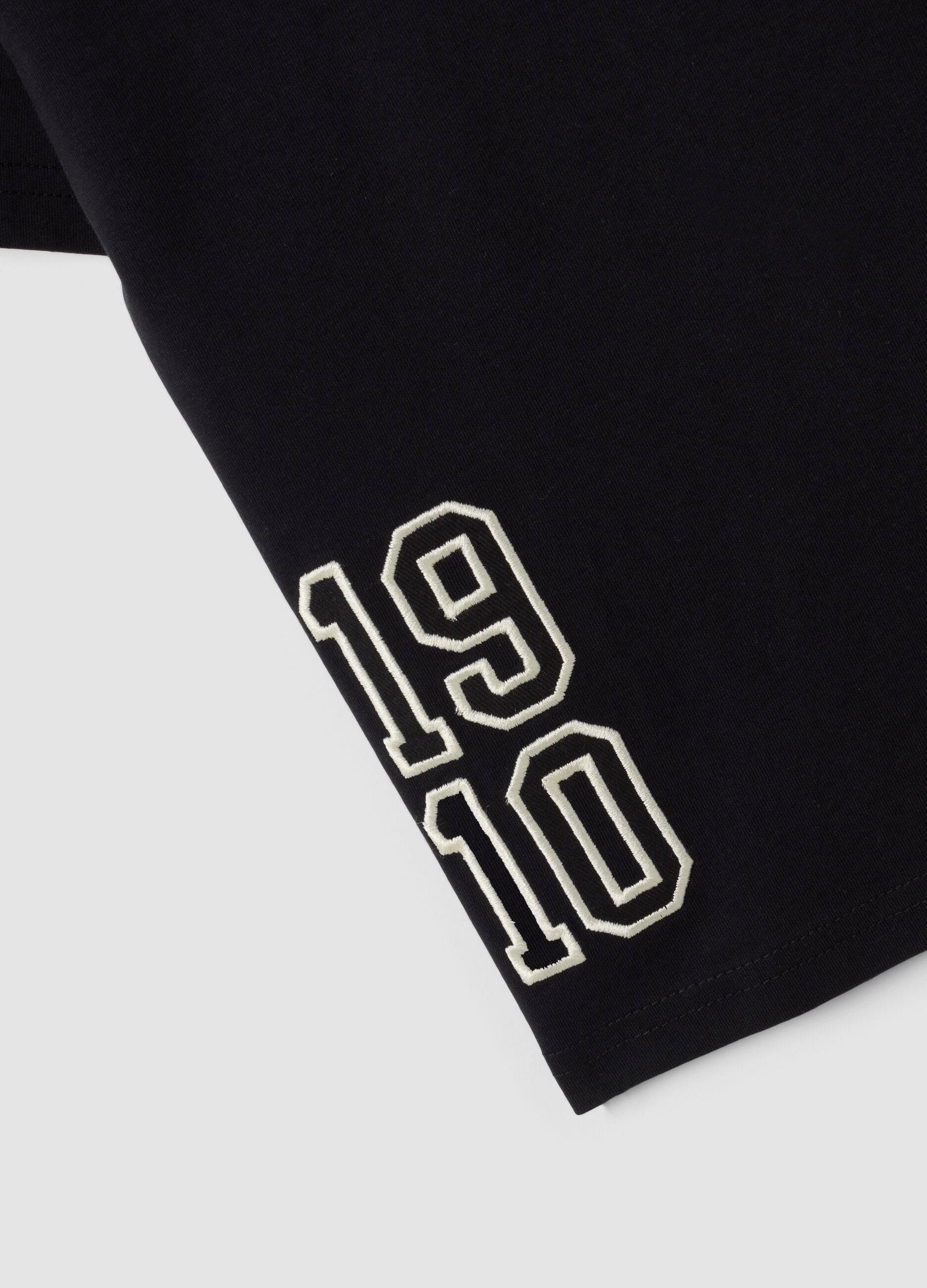 T-shirt nera in puro cotone con stampe all over per bambino