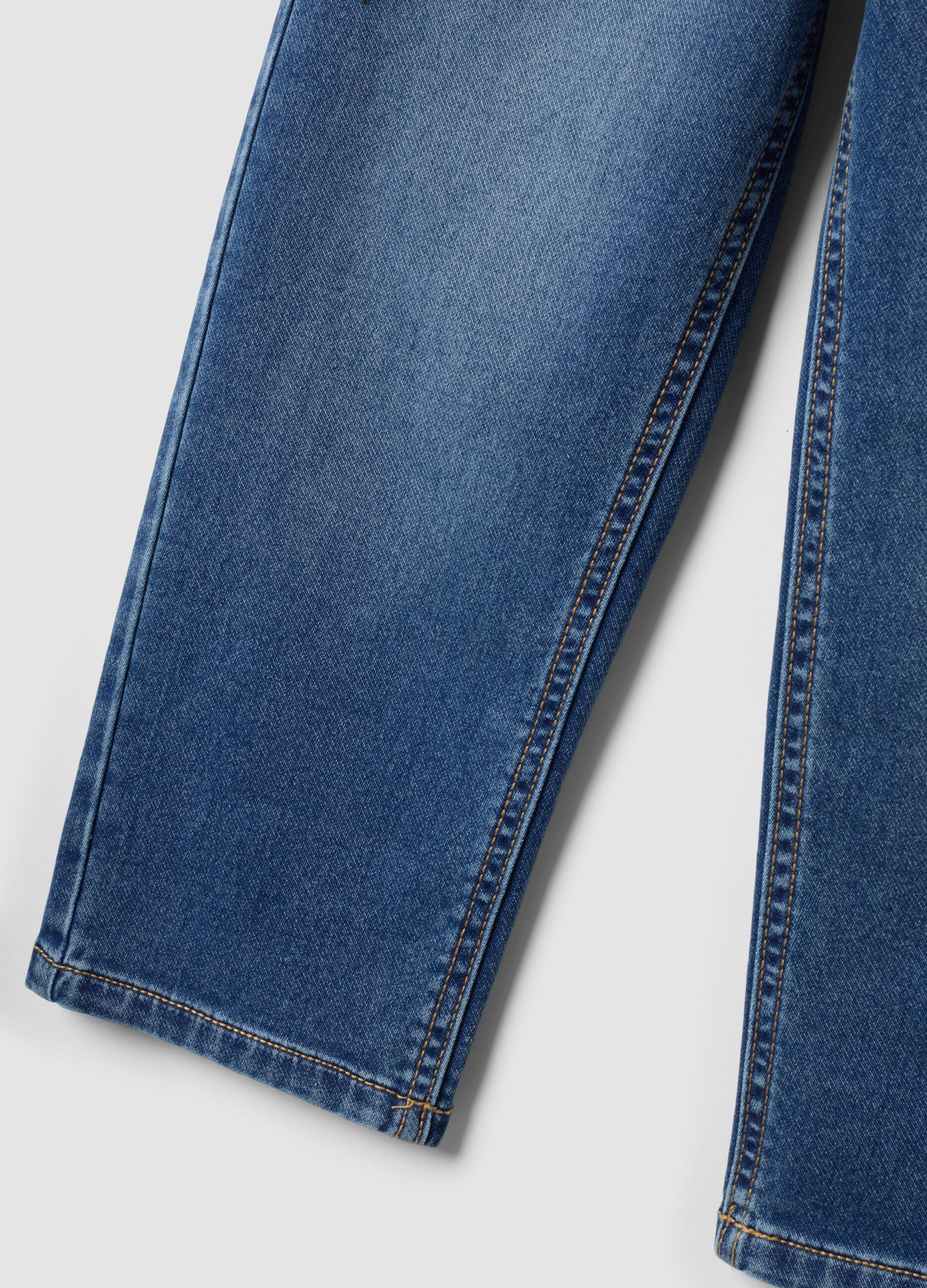 Jogger denim blu in cotone elasticizzato con vita elasticizzata per bambino