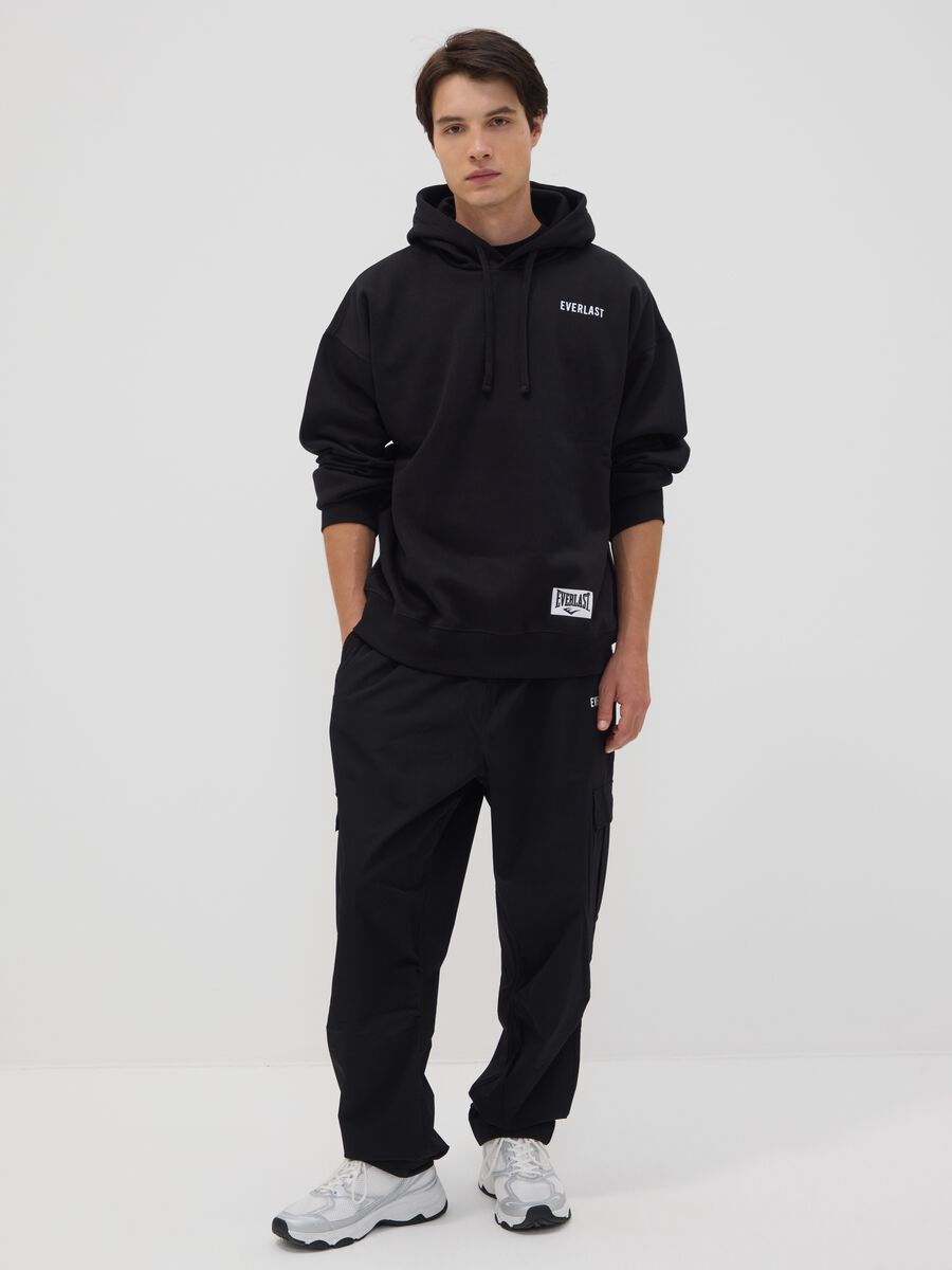 Black sporty cargo trousers with drawstring_0