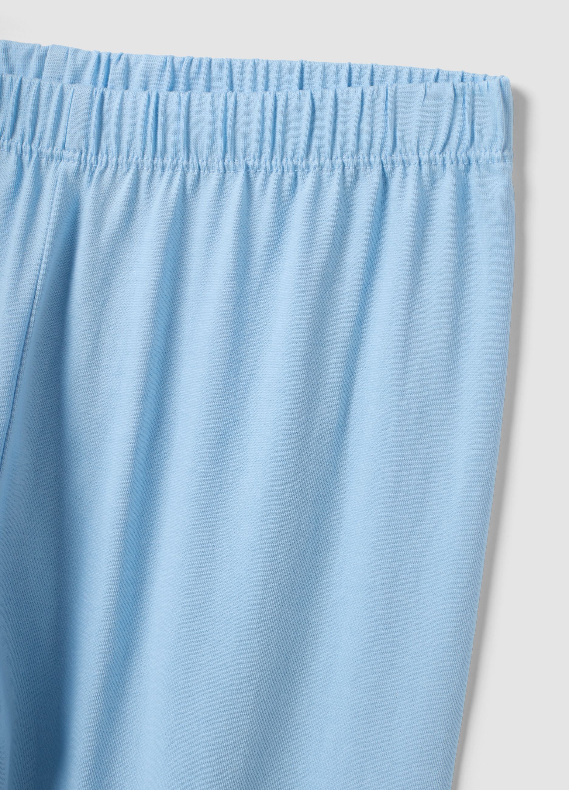 Pigiama azzurro in puro cotone organico con fantasia animalier
