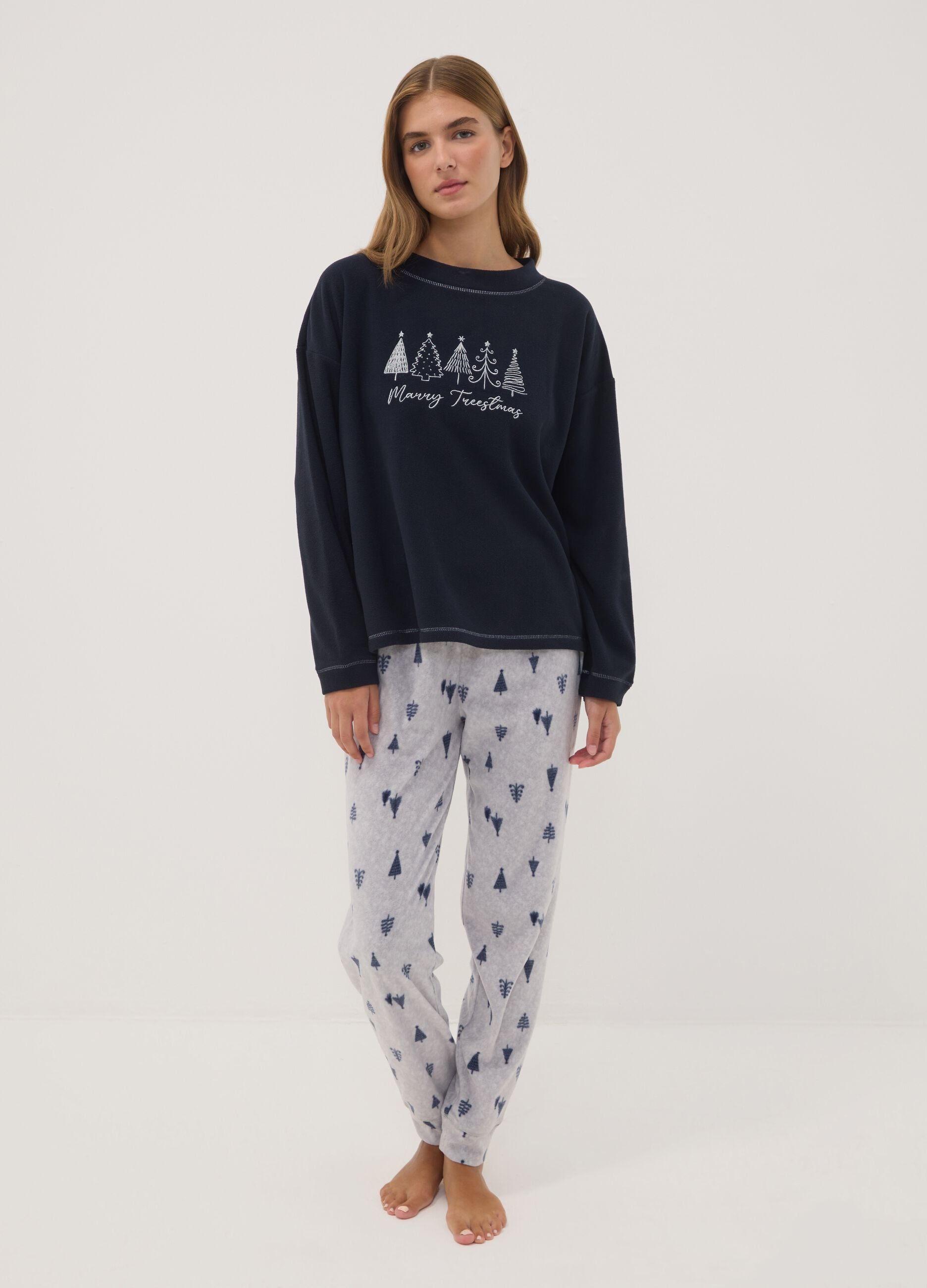 Navy fleece pyjamas with crew neck top and printed trousers
