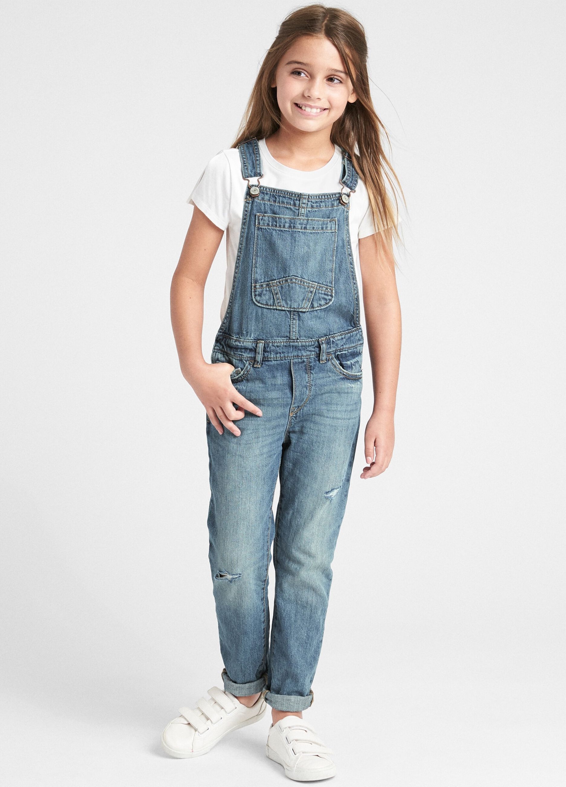 Denim dungarees with rips