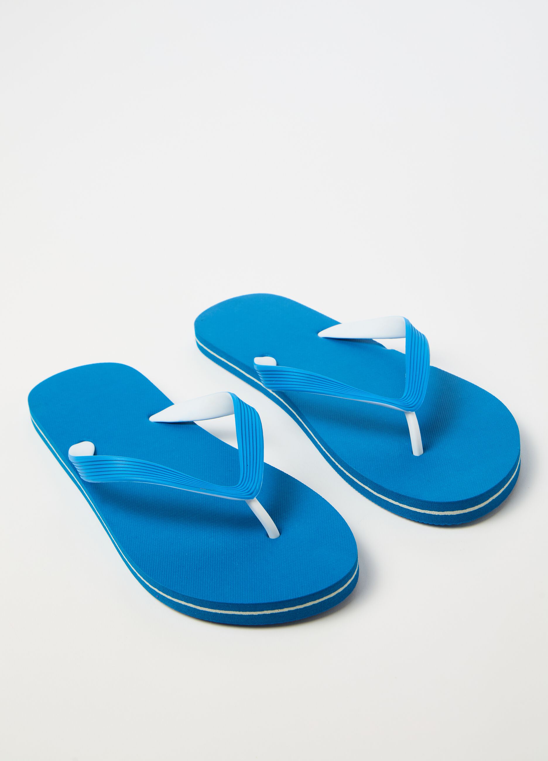 Thong sandals with striped straps