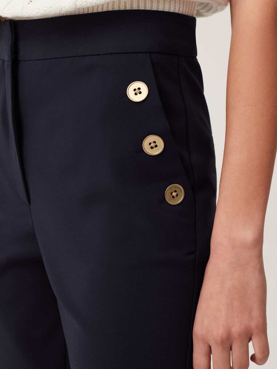 Cigarette trousers with gold-coloured buttons_3