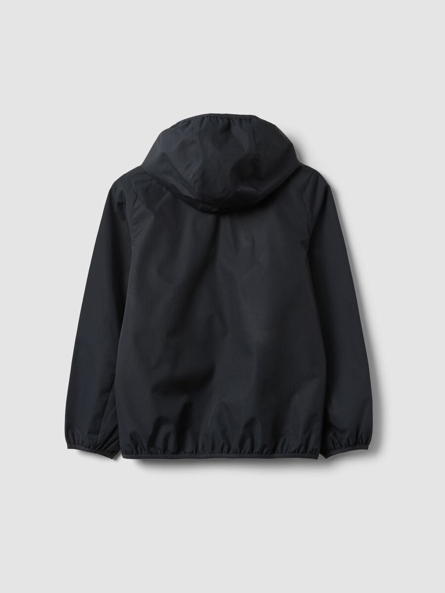 Black oversized rain jacket with hood and zip for boys_1