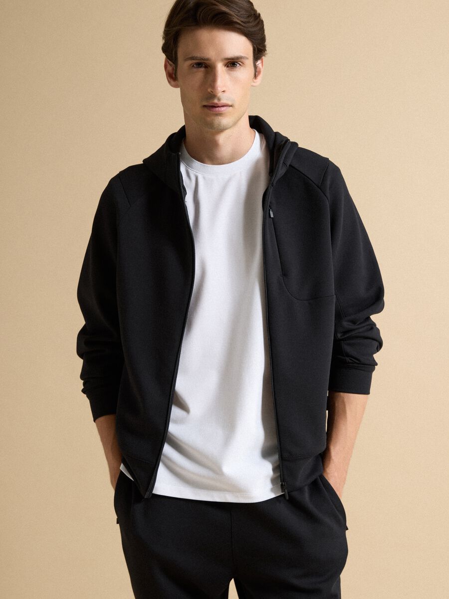 Full-zip nera traspirante in tessuto elasticizzato 2 Way Stretch_0