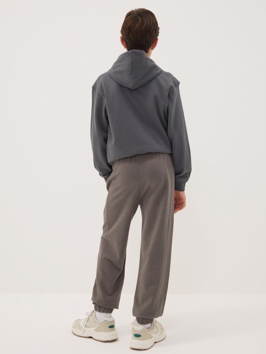 Cal&ccedil;as jogger cinzentas em algod&atilde;o puro, corte oversized, para rapaz_2