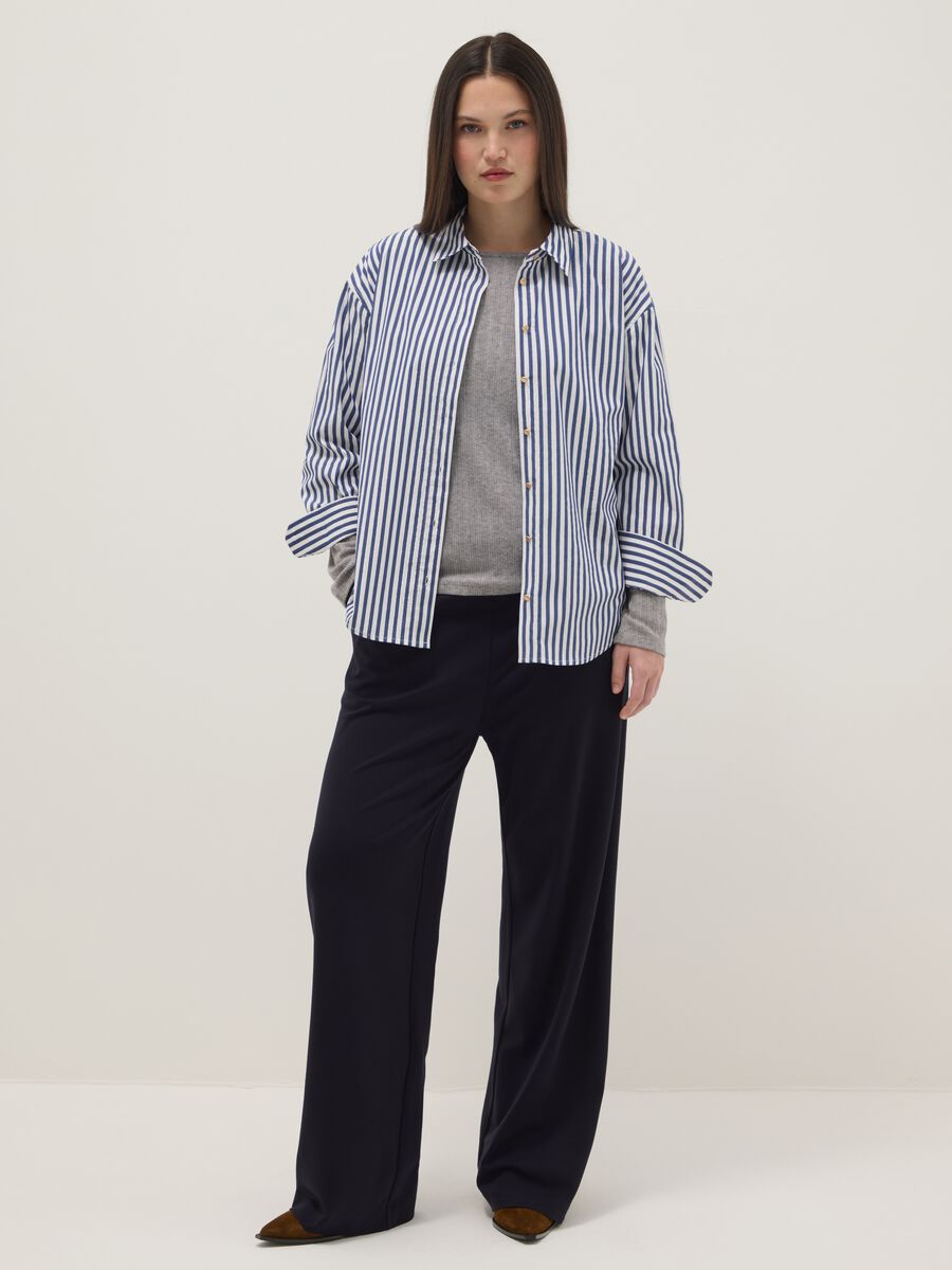 Blue Wide-Leg Trousers with Decorative Buttons_1