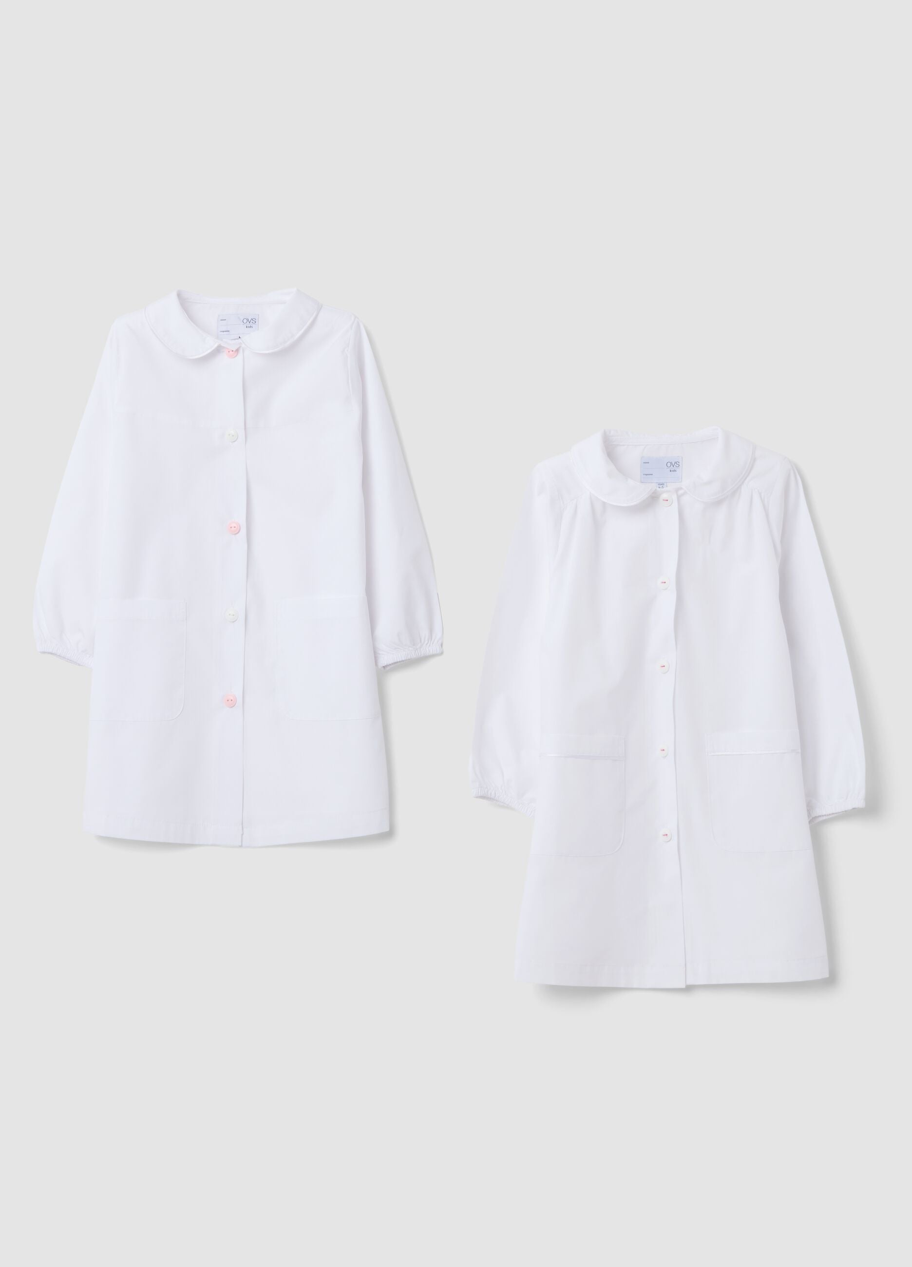 2-pack of white nursery school aprons with classic collar