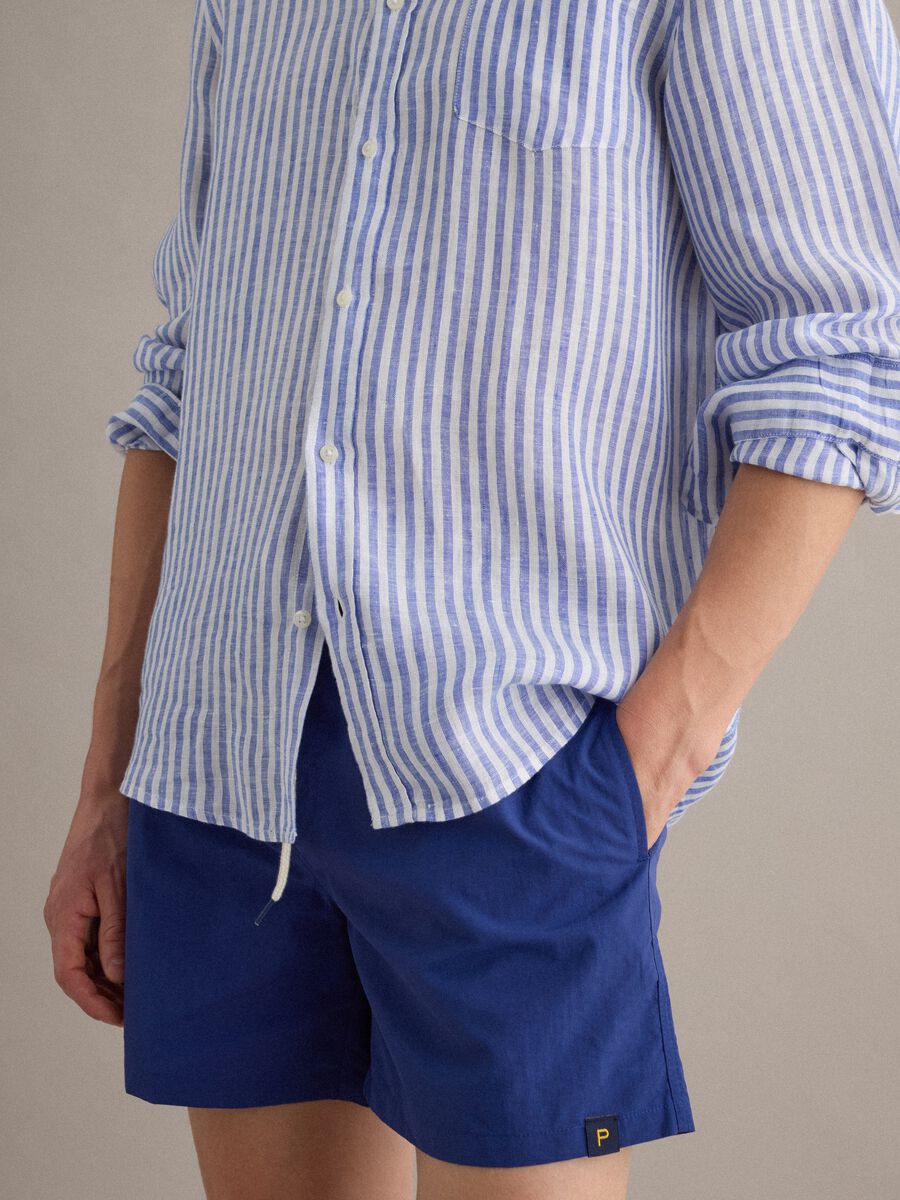 Blue swim shorts with elasticated waist and drawstring_3