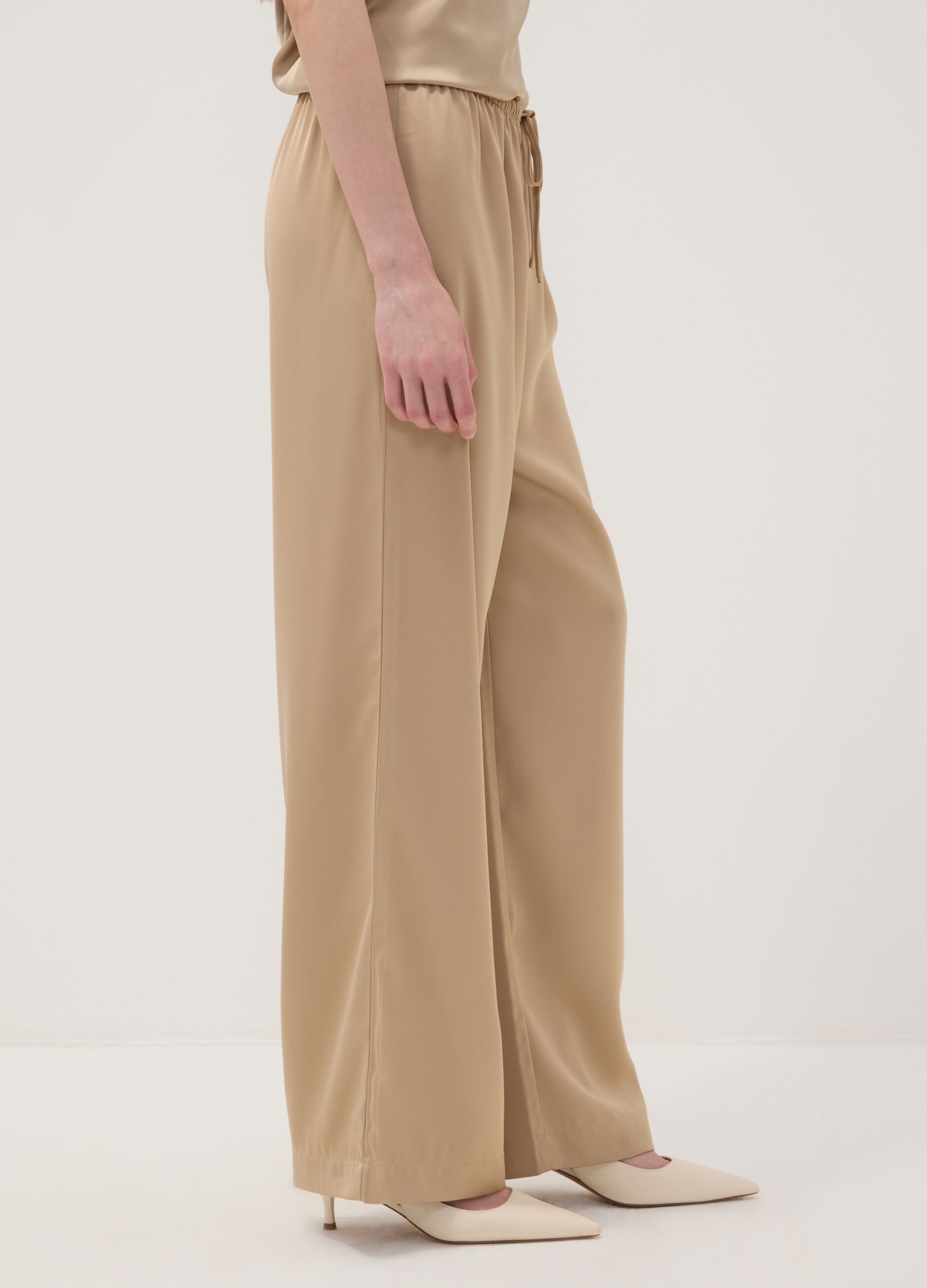 Beige wide-leg trousers with regular waist