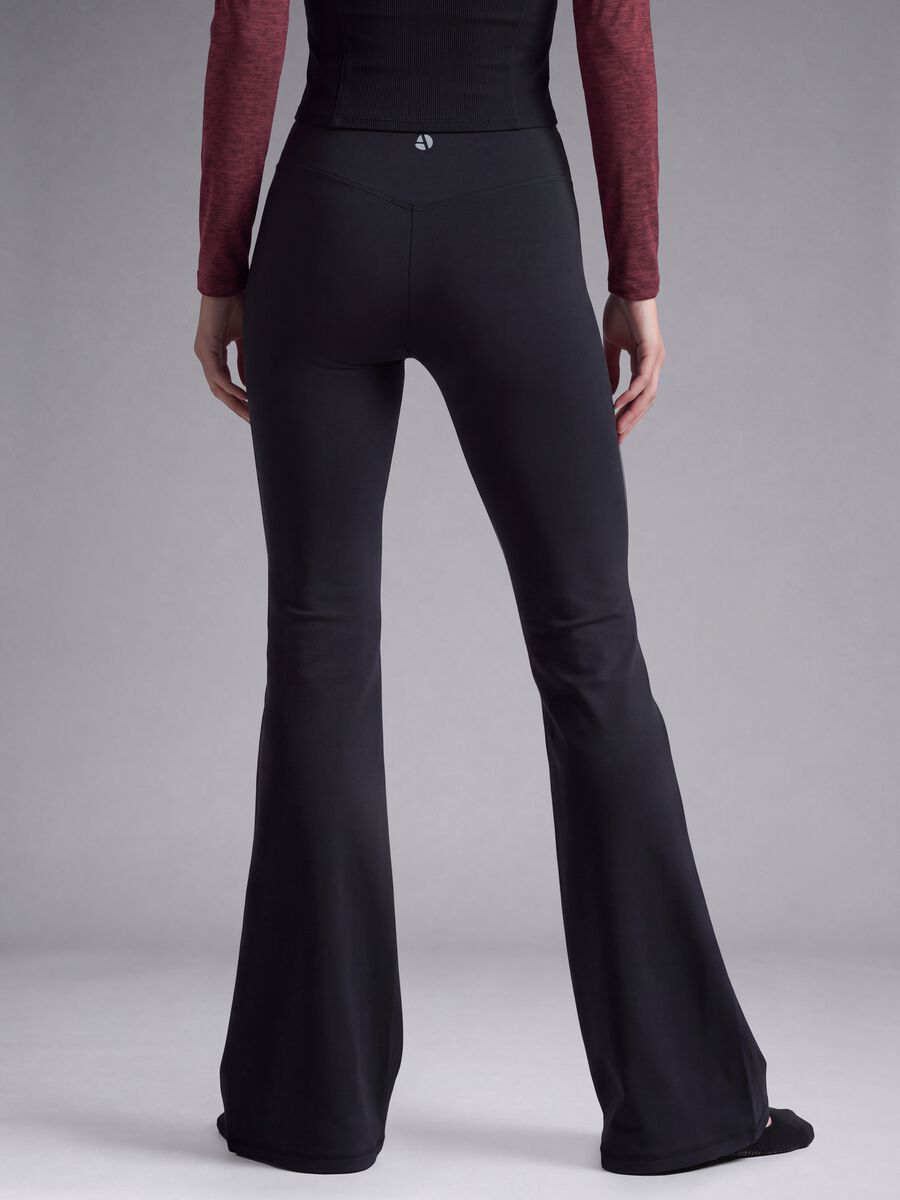 Blue flared leggings in stretchy fabric_4