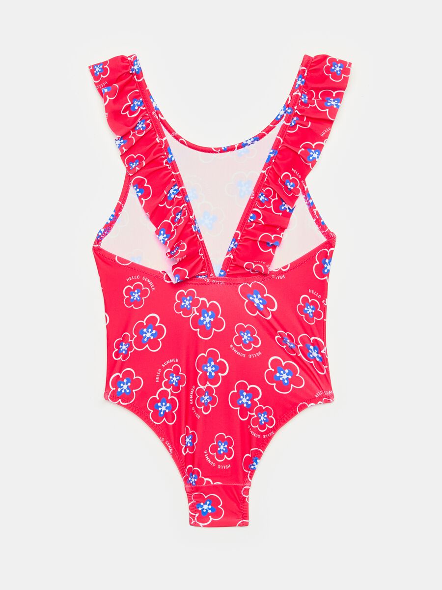 One-piece swimsuit with flounce and flowers print_1