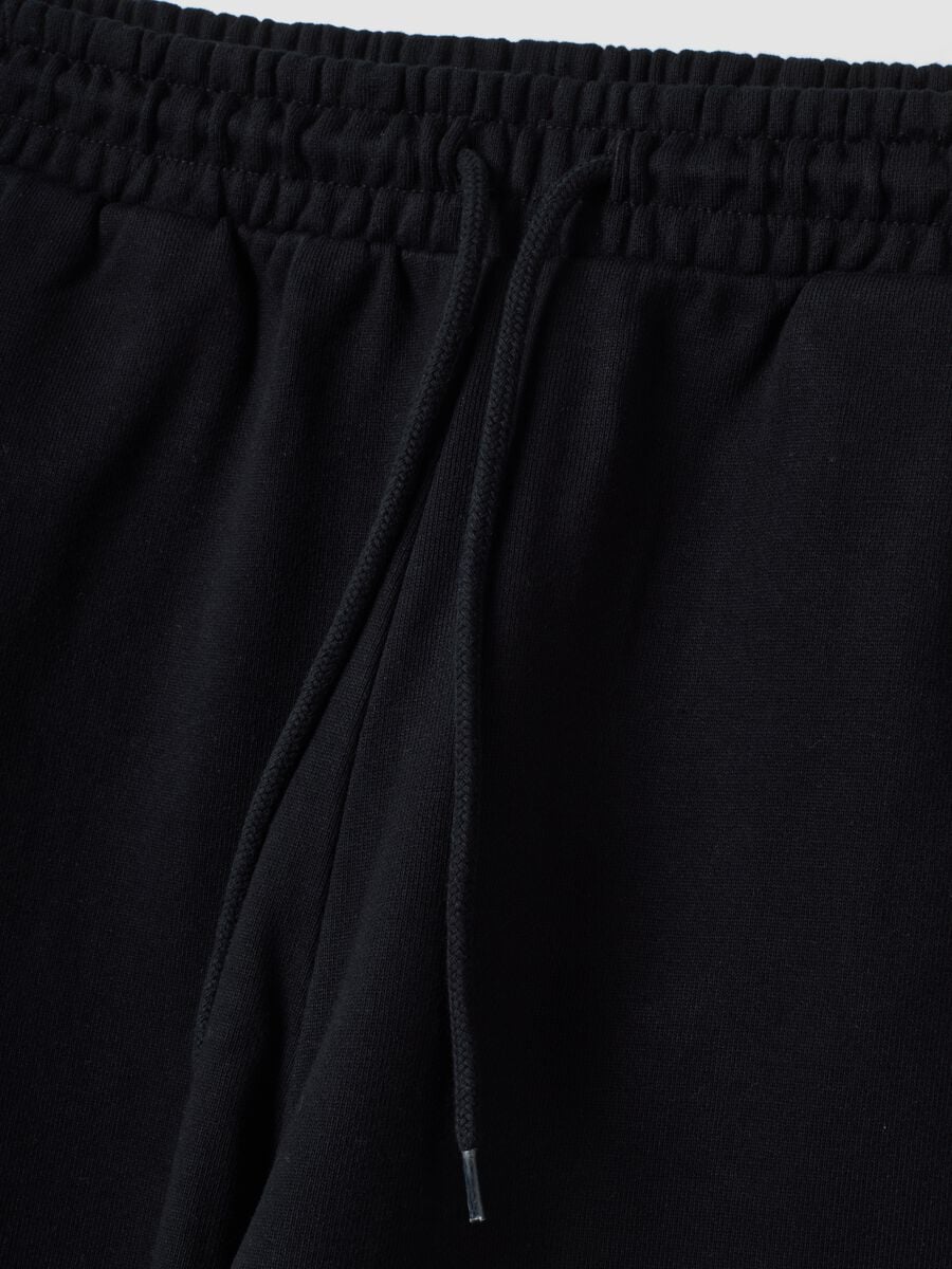 Schwarze Jogger aus reiner Baumwolle mit elastischem Bund, Oversize-Fit_1