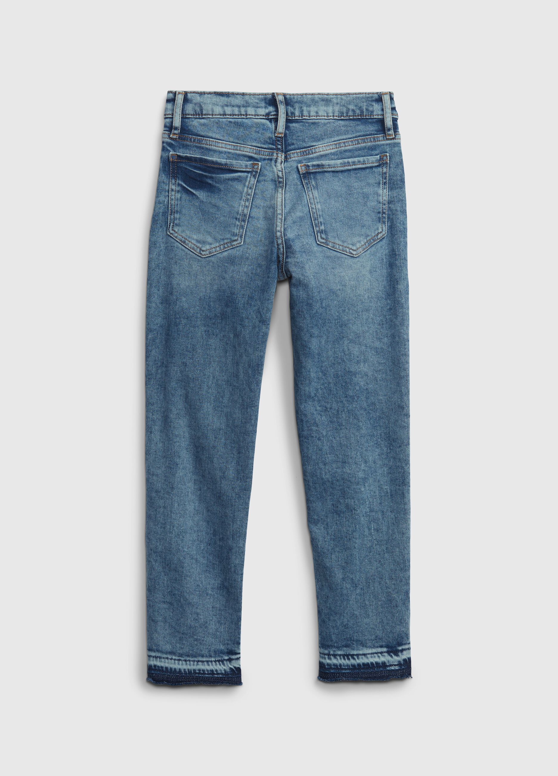 Acid-wash, high-rise, slim-fit jeans