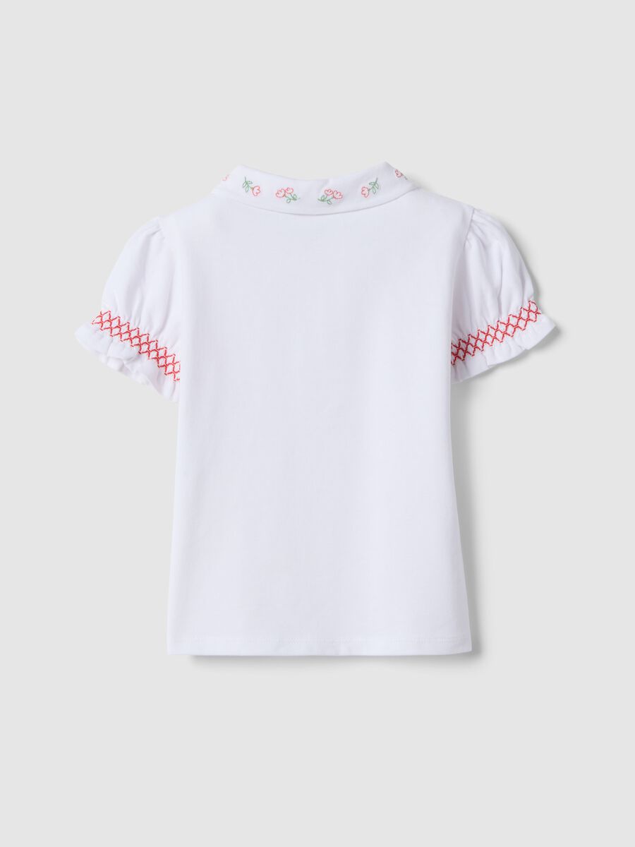 White stretchy cotton girls' polo shirt regular fit with embroidery_1