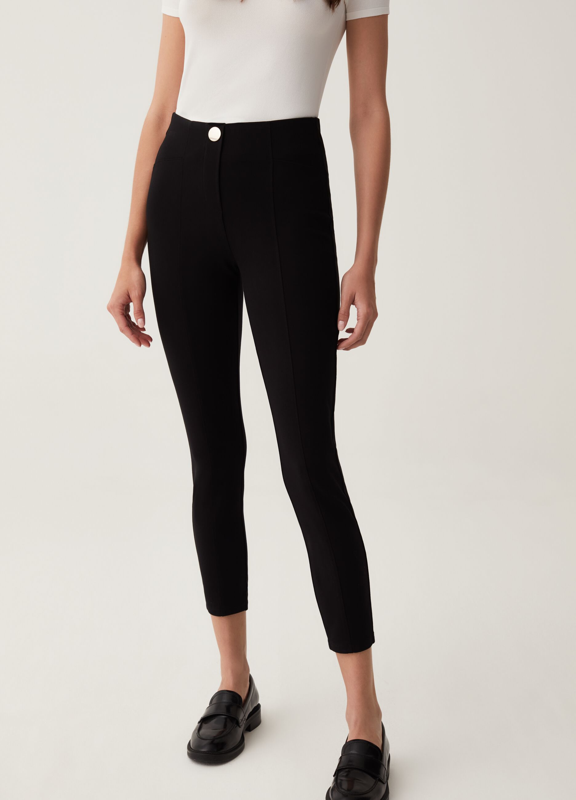 Stretch leggings with button_1