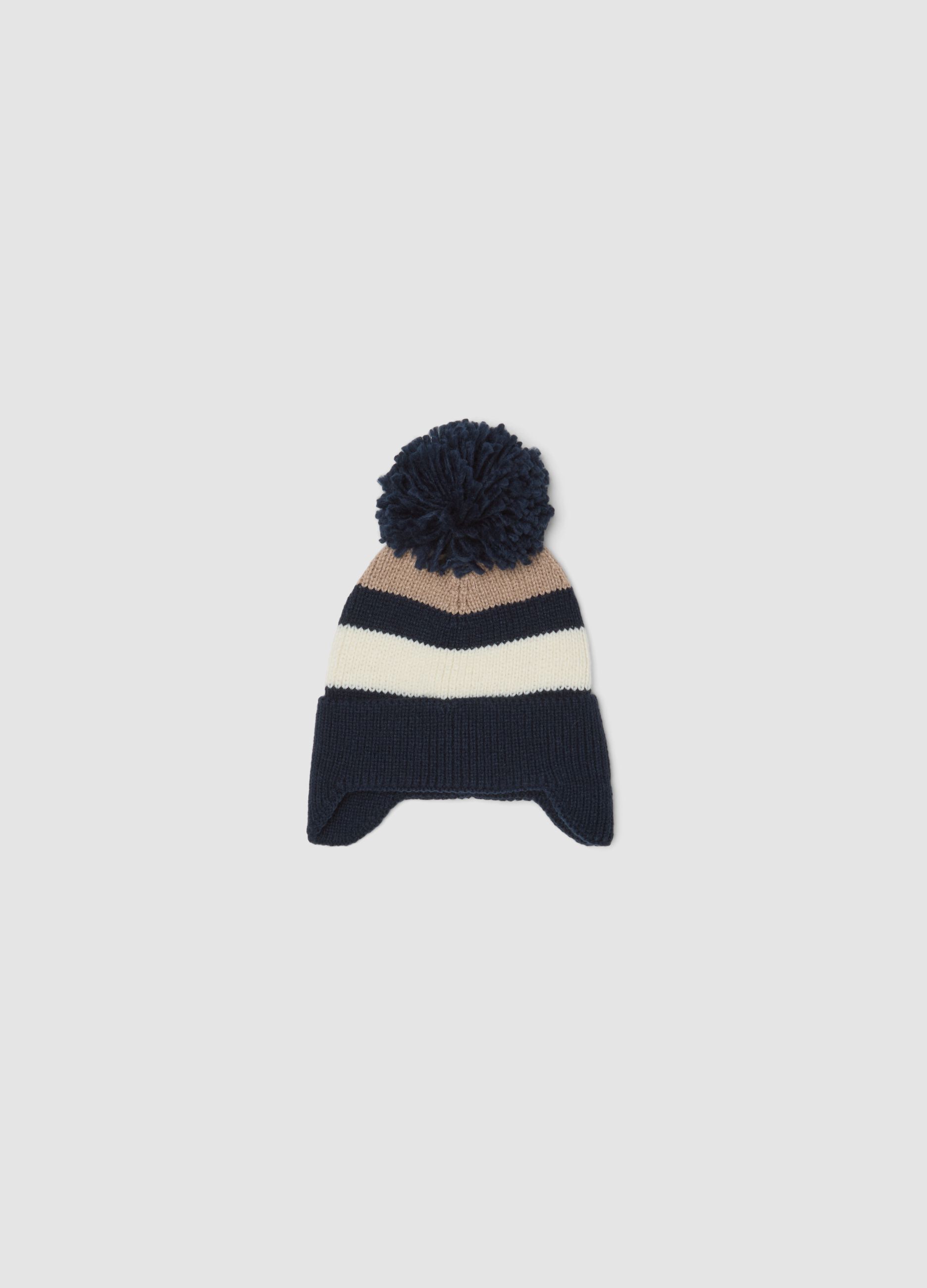 Cappello blu navy, avorio e beige chiaro con pon pon